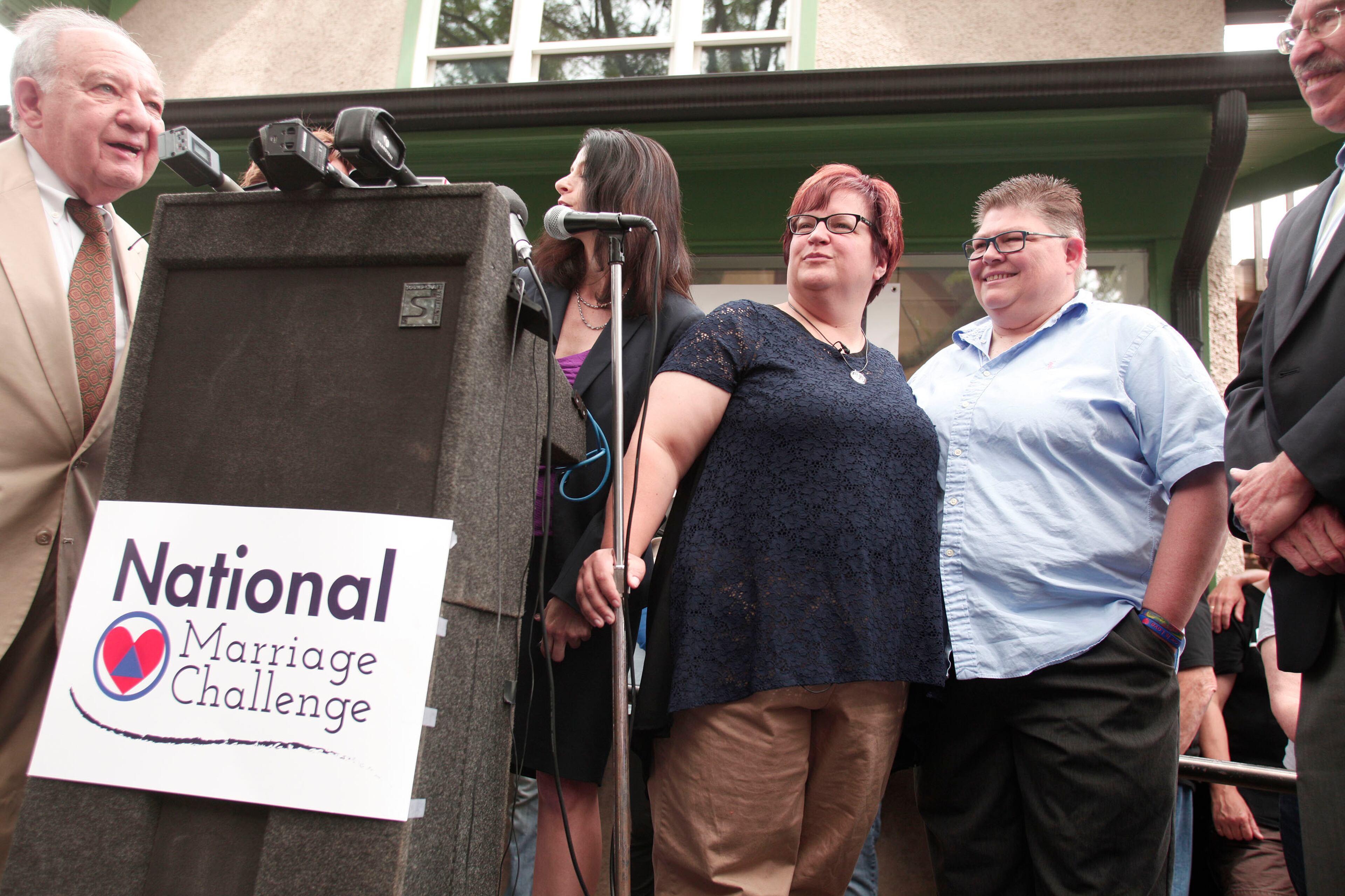 ANN ARBOR, MI - JUNE 26: April DeBoer (third from left) and Jayne Rowse (fourth from left), a same-sex couple with four adopted children, celebrate the Supreme Court's ruling on gay marriage at a press conference June 26th, 2015 in Ann Arbor, Michigan. The U.S. Supreme Court ruled that same-sex couples have the right t marry in all 50 states. (Photo by Bill Pugliano/Getty Images)