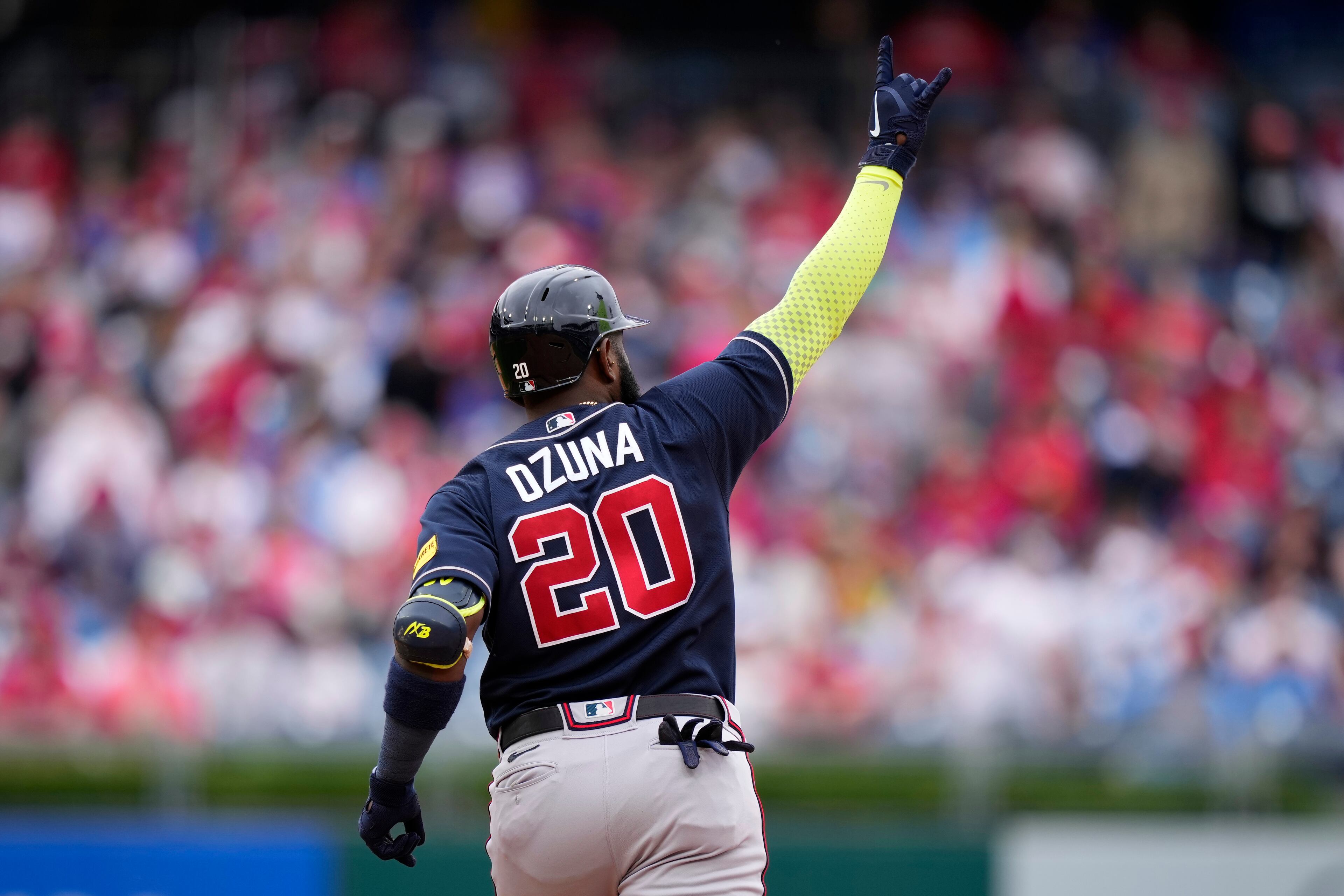 Atlanta Braves' Marcell Ozuna reacts after hitting a two-run home run against Philadelphia Phillies pitcher Yunior Marte during the 10th inning of a baseball game, Thursday, June 22, 2023, in Philadelphia. (AP Photo/Matt Slocum)