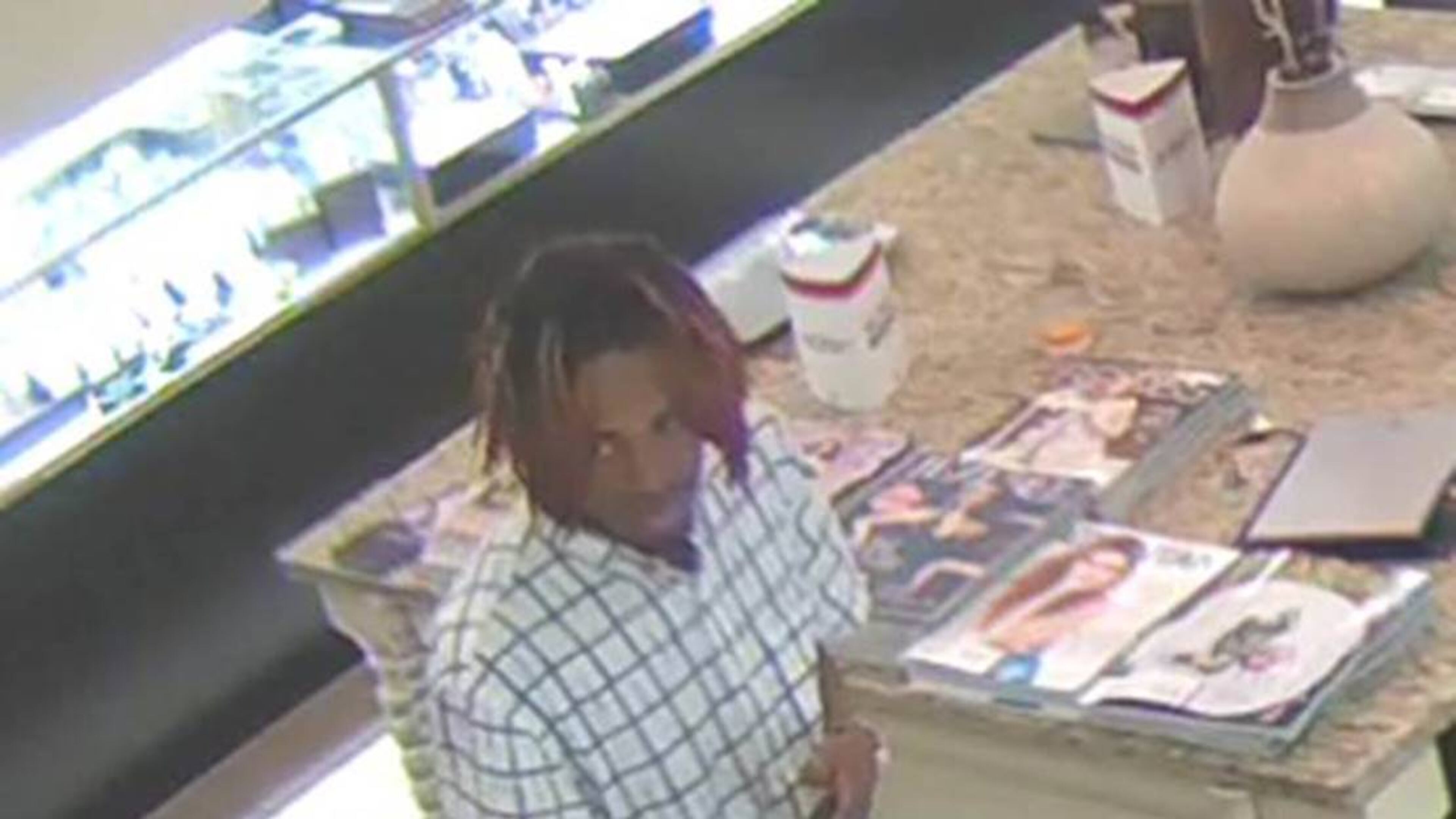Police want to speak to this man about the Wednesday robbery and shooting at Lenox Square. (Credit: Atlanta Police Department)