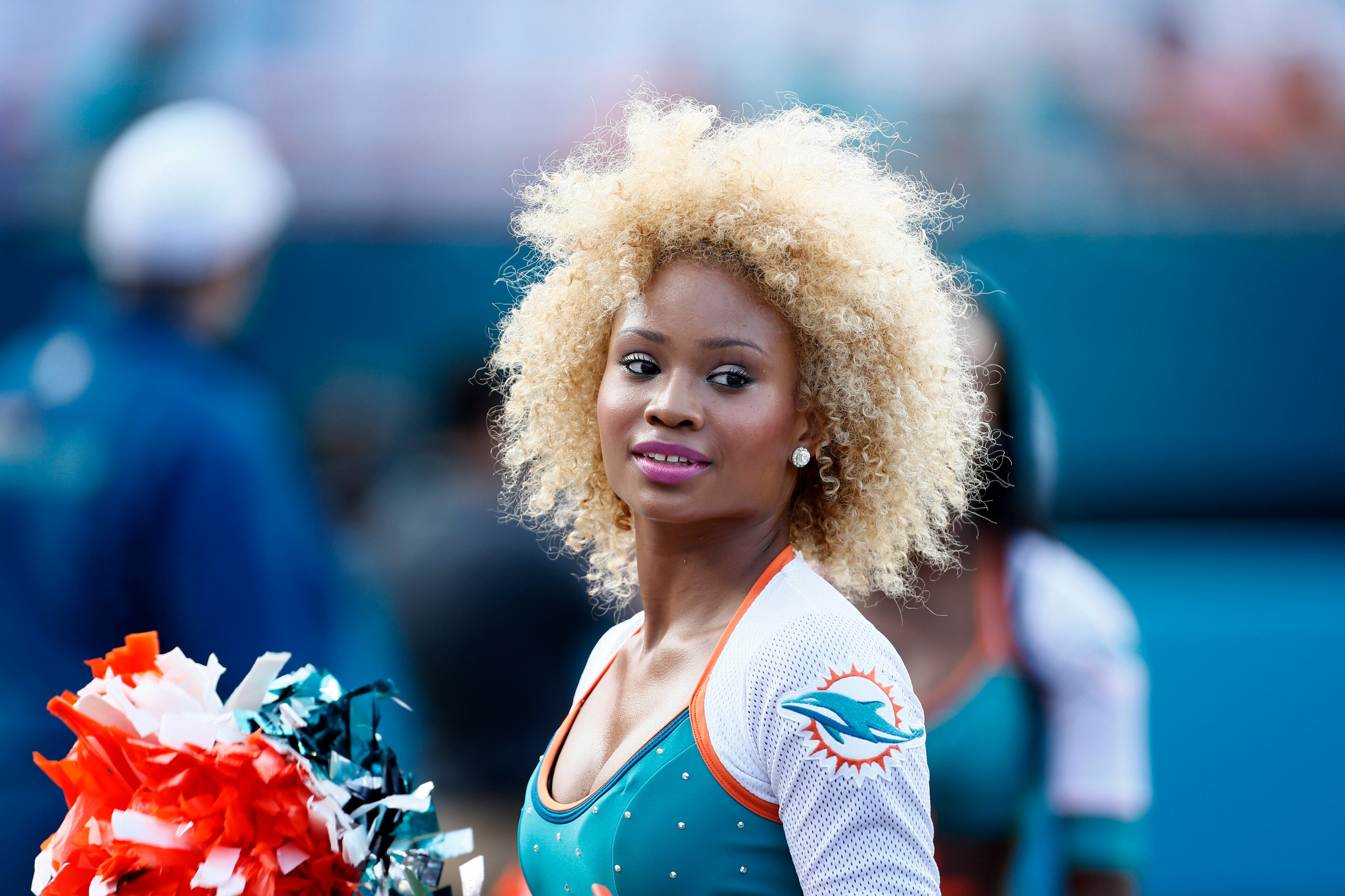 A Miami Dolphins cheerleader.