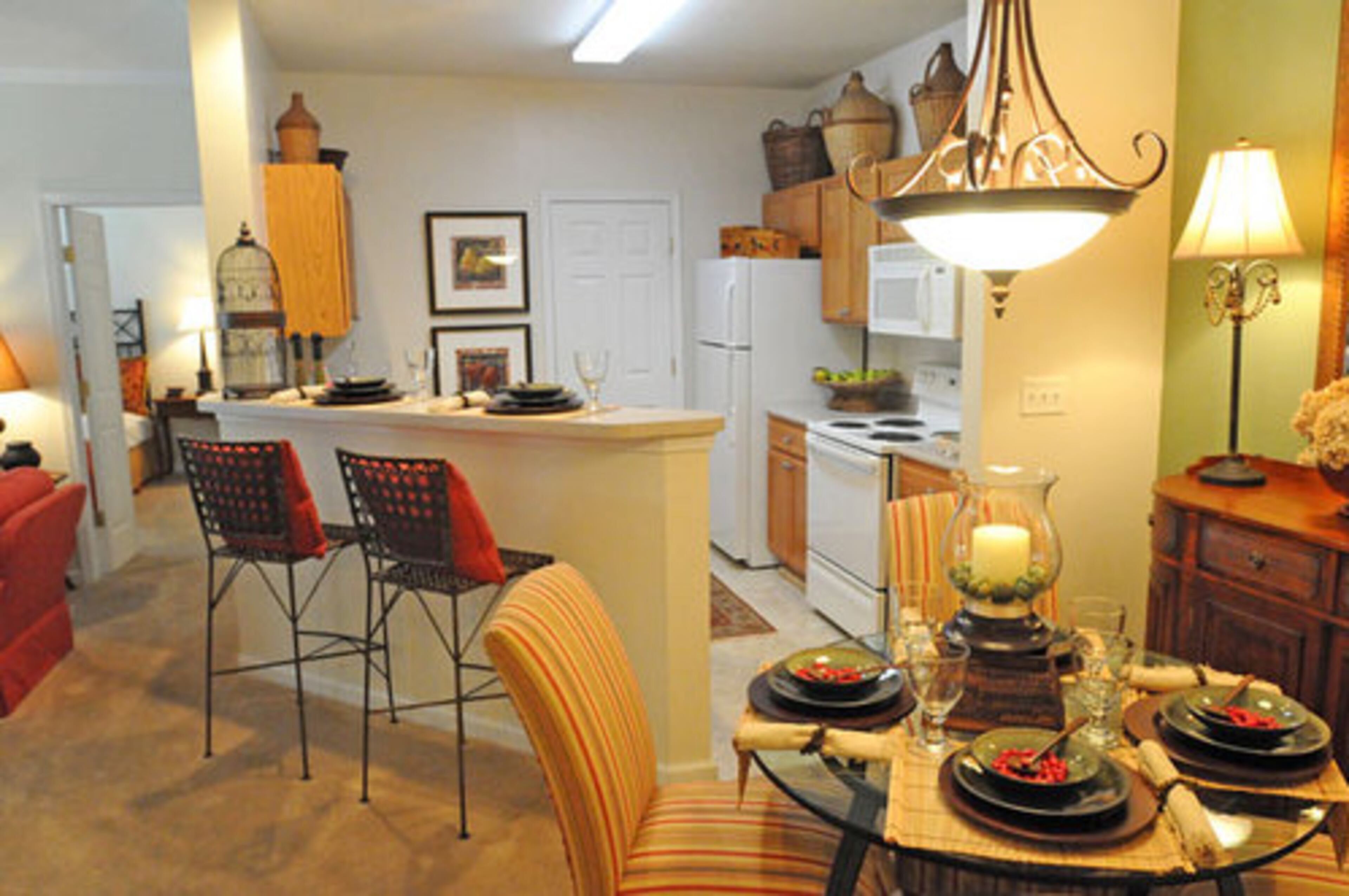 Units are energy-efficient and feature traditional oak kitchen cabinetry and breakfast bars.