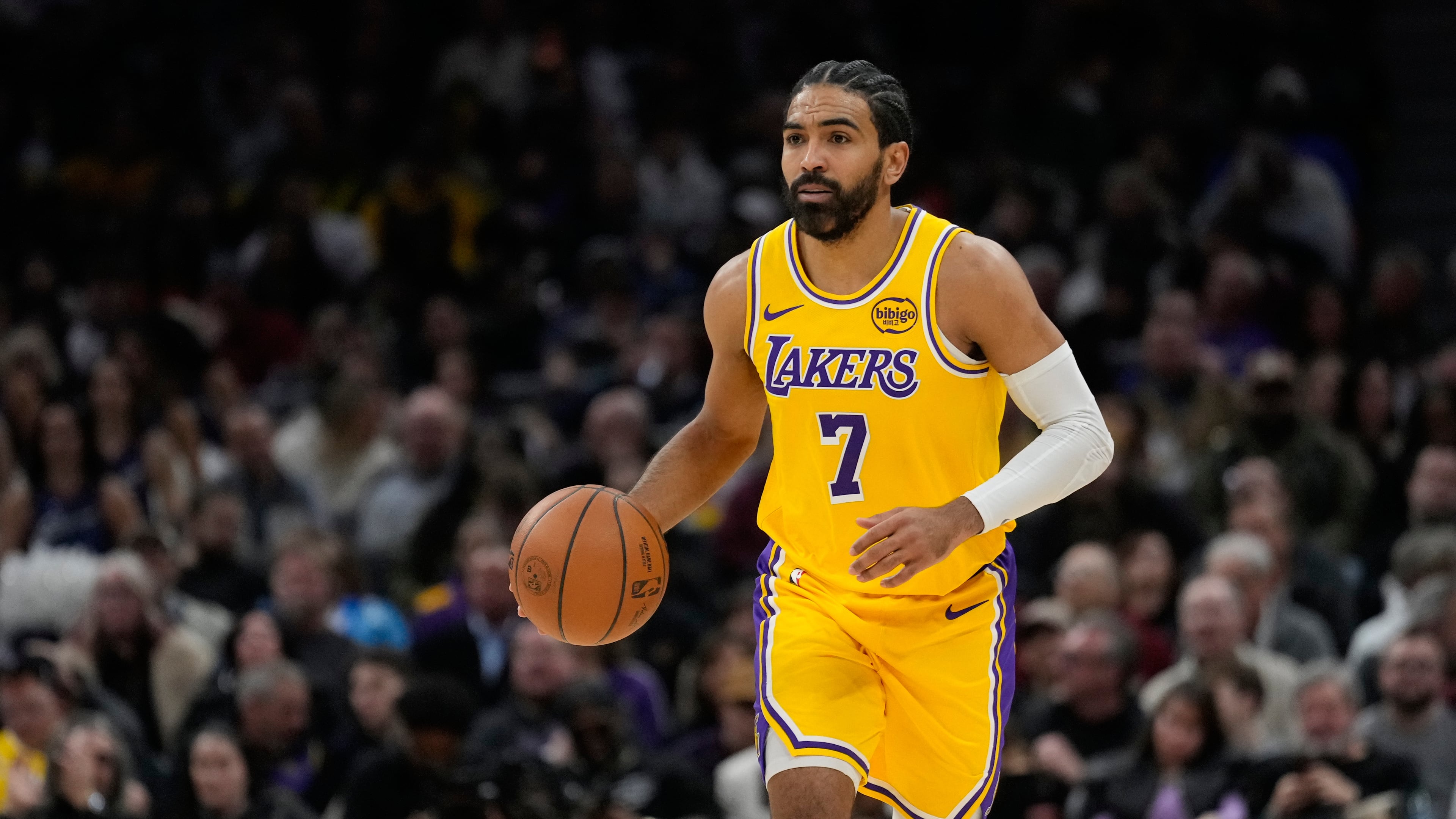 Gabe Vincent comes to the Hawks from the Lakers in a trade for guard Luke Kennard. (Sue Ogrocki/AP)