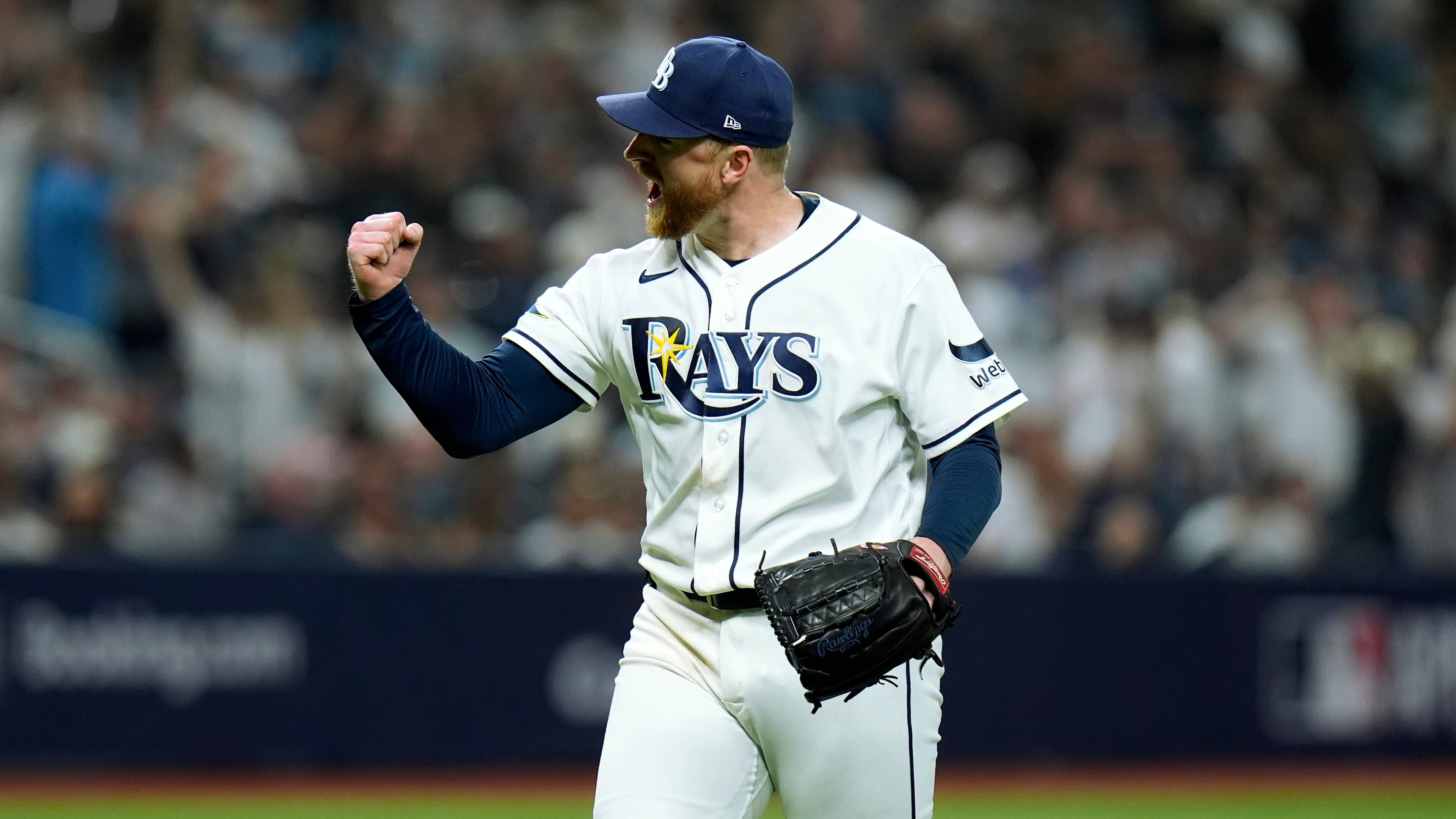 Tampa Bay Rays pitcher Drew Rasmussen celebrates after striking out New York Yankees' Cody Bellinger to end the top of the sixth inning of Game 1 of an American League Division Series baseball game Saturday, Oct. 3, 2026, in St. Petersburg, Fla. (AP Photo/Chris O'Meara)
