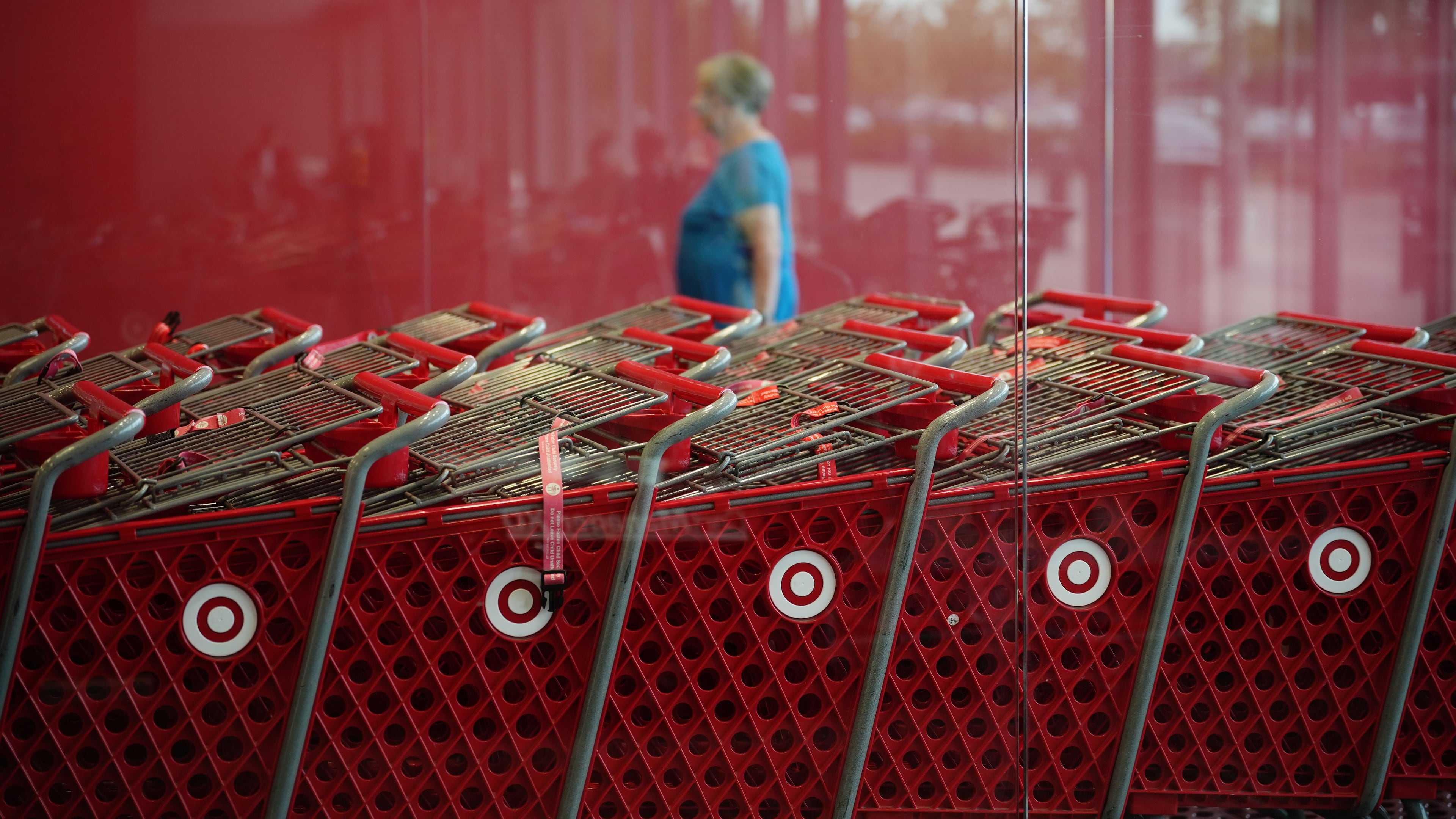 A shopper enters a Target store, Thursday, Aug. 13, 2026, in Woodbury, Minn. (AP Photo/Ellen Schmidt)