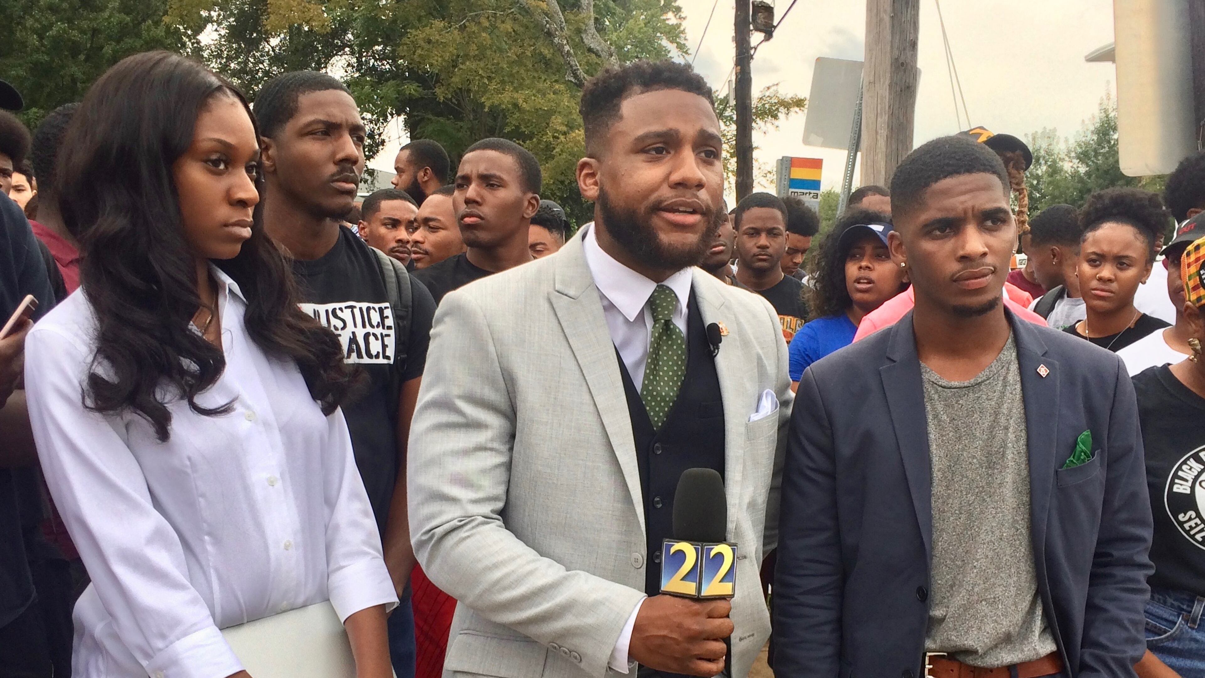 Spelman College student Anta Njie, We The People Atlanta organizer Charles Bourgeois and Morehouse College student Chinelo Tyler speak on the Atlanta University Center campus Saturday about the Millennials March. CHRIS JOYNER / CJOYNER@AJC.COM