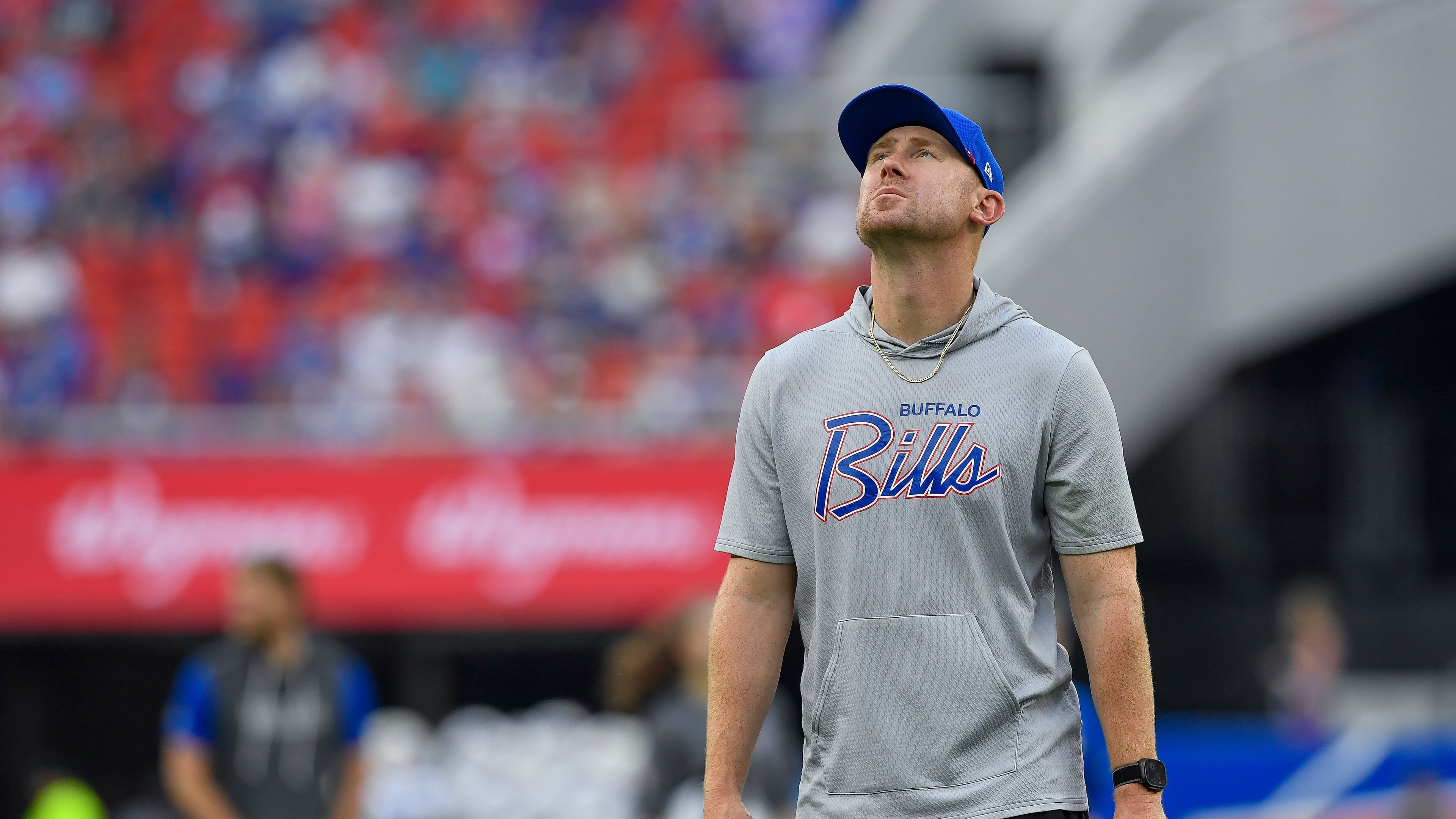 Buffalo Bills head coach Joe Brady looks around the stadium during practice at the team's NFL football training camp Saturday, Aug. 8, 2026, in Orchard Park, N.Y. (AP Photo/Adrian Kraus)