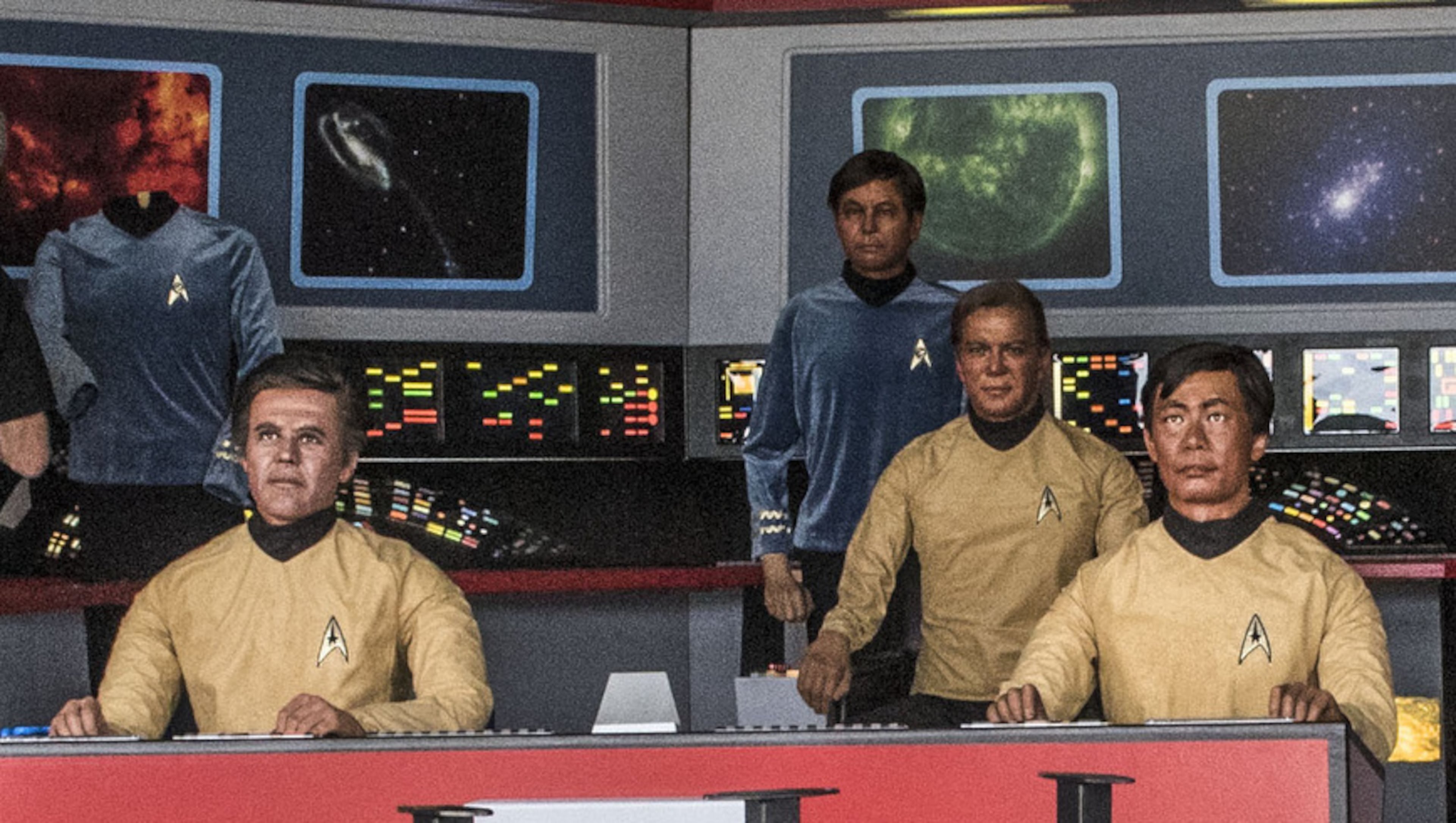 In this Saturday, March 25, 2017 photo, Steve Greenthal, left, and Chris Liebl work to set up their Star Trek wax figures in a hangar at the Fullerton Airport before donating them to the Hollywood Science Fiction Museum, in Fullerton, Calif. The figures are being restored for a five-year tour to raise money to get the museum a permanent home. (Nick Agro /The Orange County Register via AP)