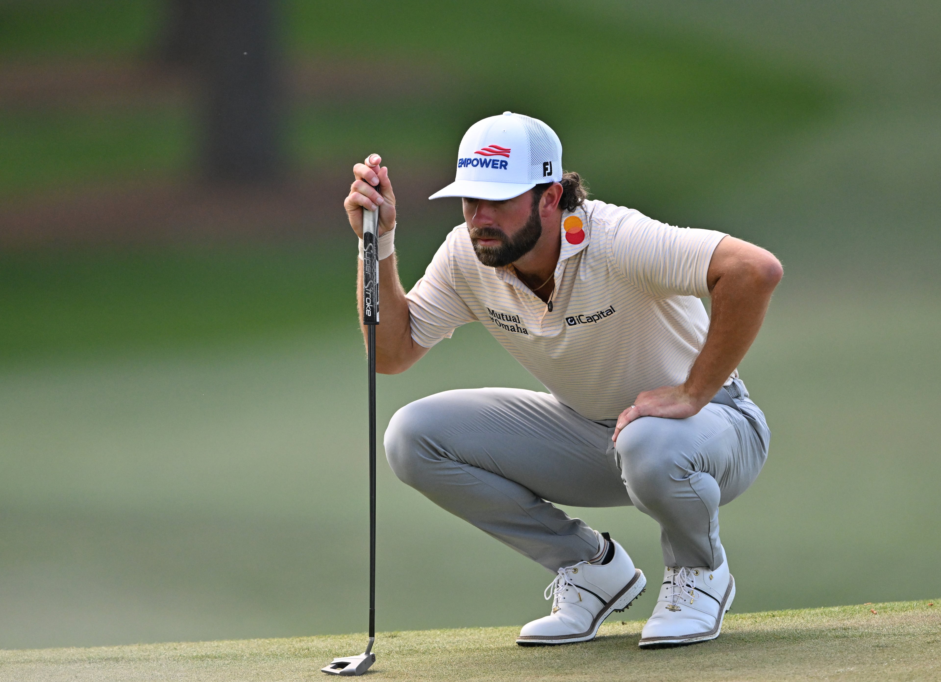 Cameron Young lines up putt on seventh green during final round of the Masters, at Augusta National Golf Club, Sunday, April 12, 2026, in Augusta, GA (Hyosub Shin/AJC)