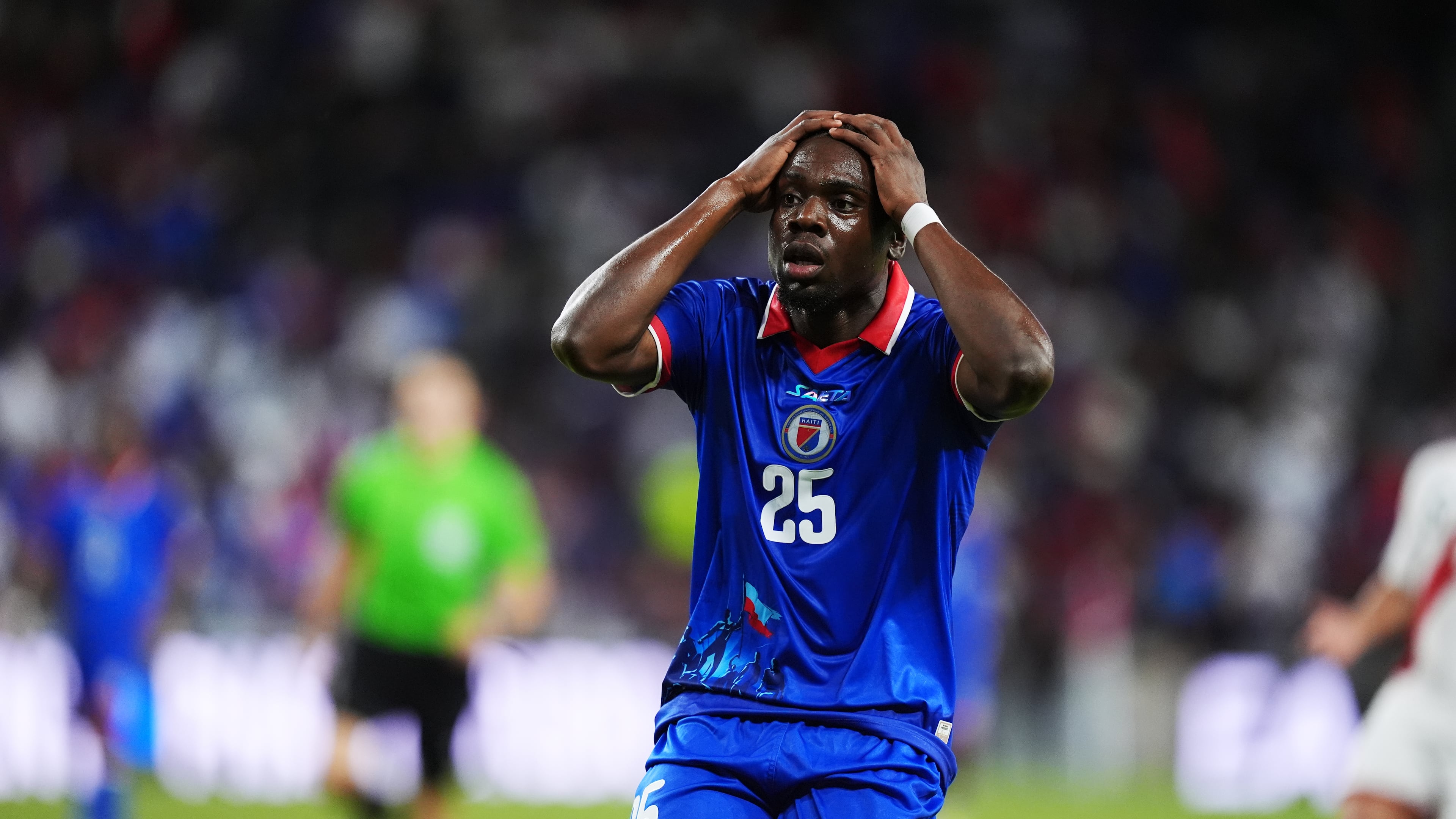 Haiti midfielder Dominique Simon reacts following an unsuccessful scoring attempt during the second half of an international friendly soccer match against Peru, Friday, June 5, 2026, in Miami. (AP Photo/Rebecca Blackwell)