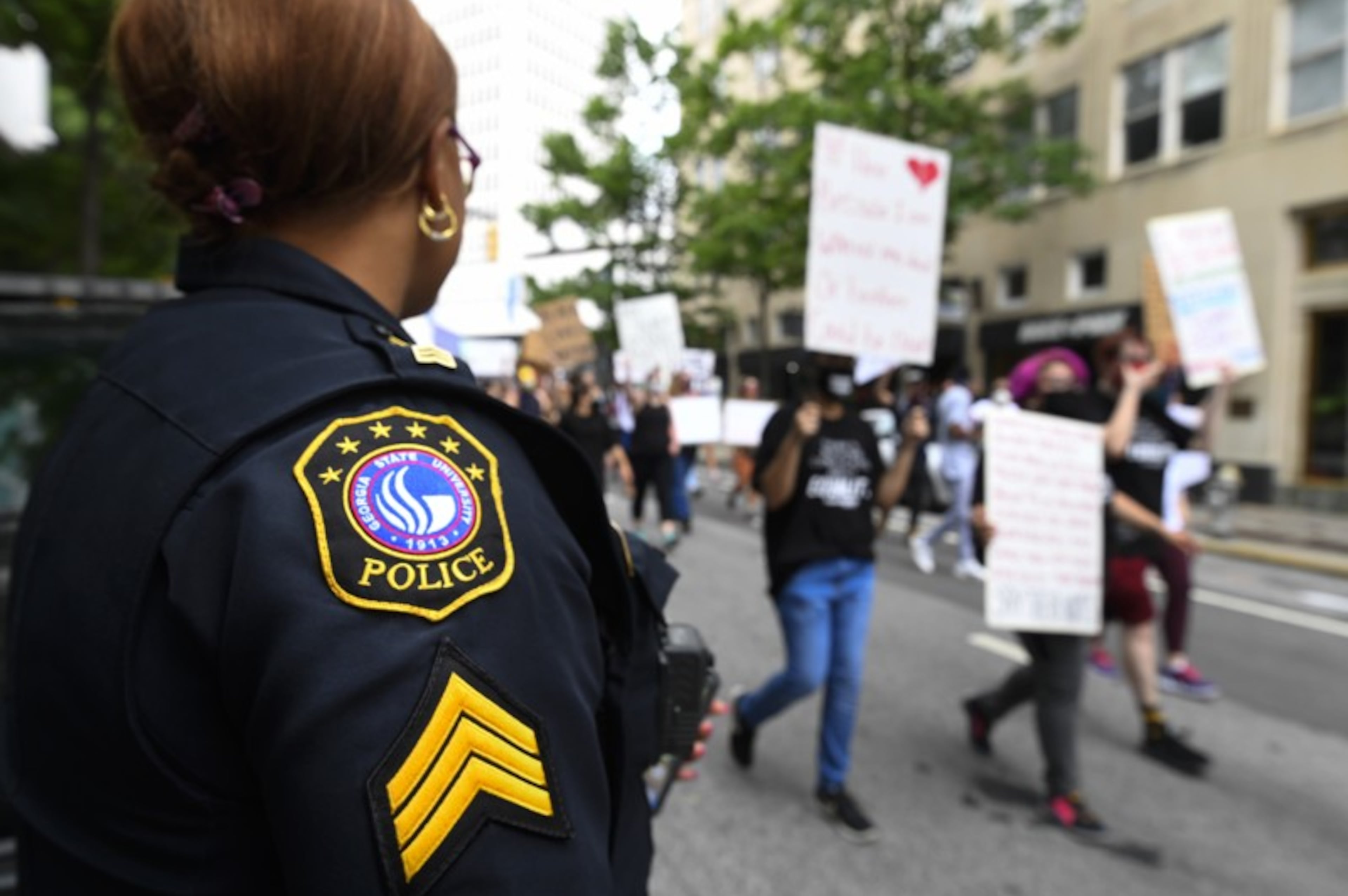‘You become blue’: Tension between Black cops, residents