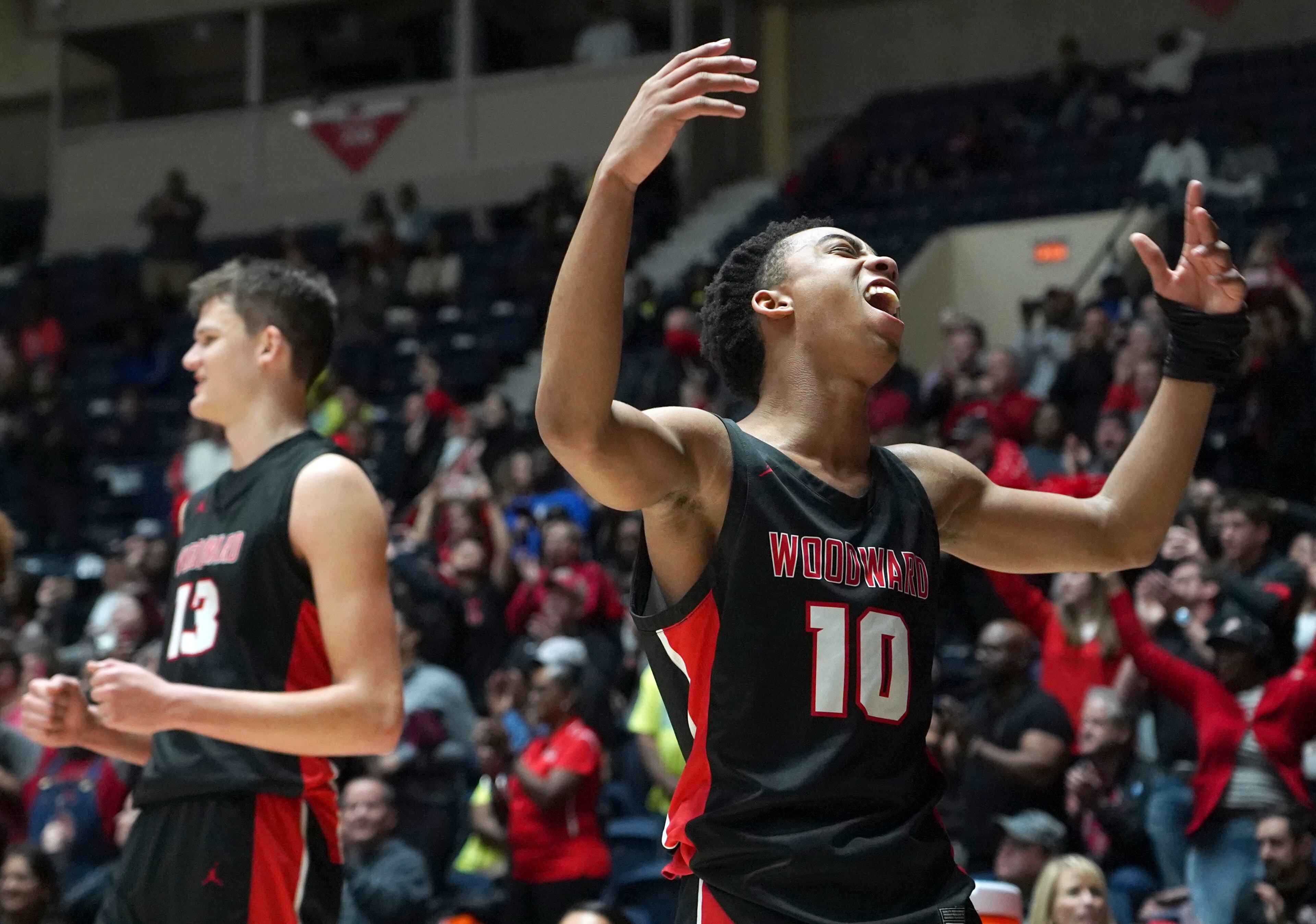 Woodward Academy's Michael Whitmore (10) celebrates in the closing seconds of the win along with teammate Walker Kessler (13). Tami Chappell for the Atlanta Journal Constitution