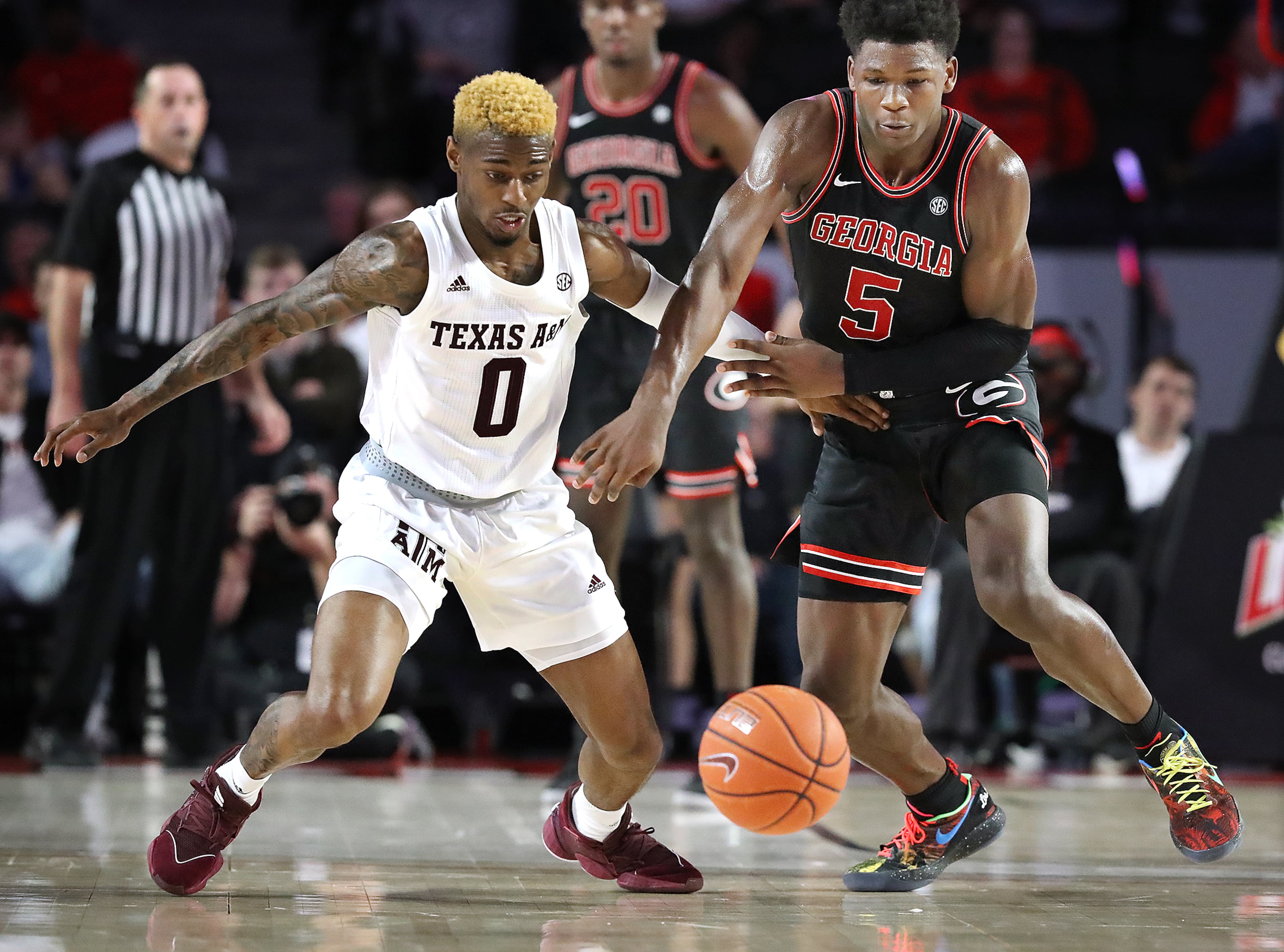 Georgia guard Anthony Edwards steals from Texas A&M guard Jay Jay Chandler during a 63-48 Georgia victory in a NCAA college basketball game on Saturday, Feb. 1, 2020, in Athens. Curtis Compton ccompton@ajc.com
