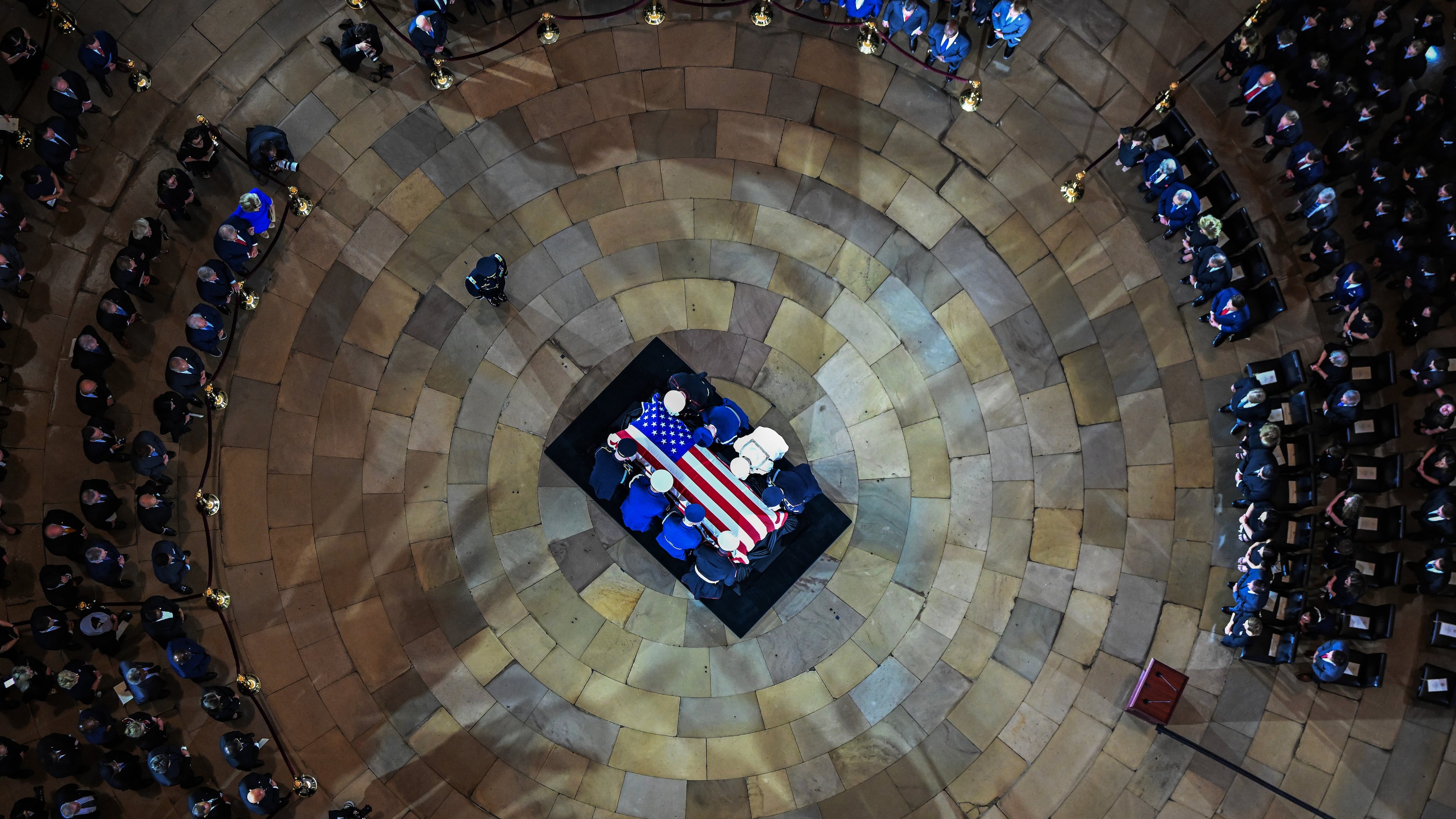 An Armed Forces Body Bearer Team moves the casket of Sen. Lindsey Graham, R-S.C., into the Rotunda of the U.S. Capitol for a Congressional tribute Tuesday, July 28, 2026, in Washington.(Kenny Holston/The New York Times via AP, Pool)