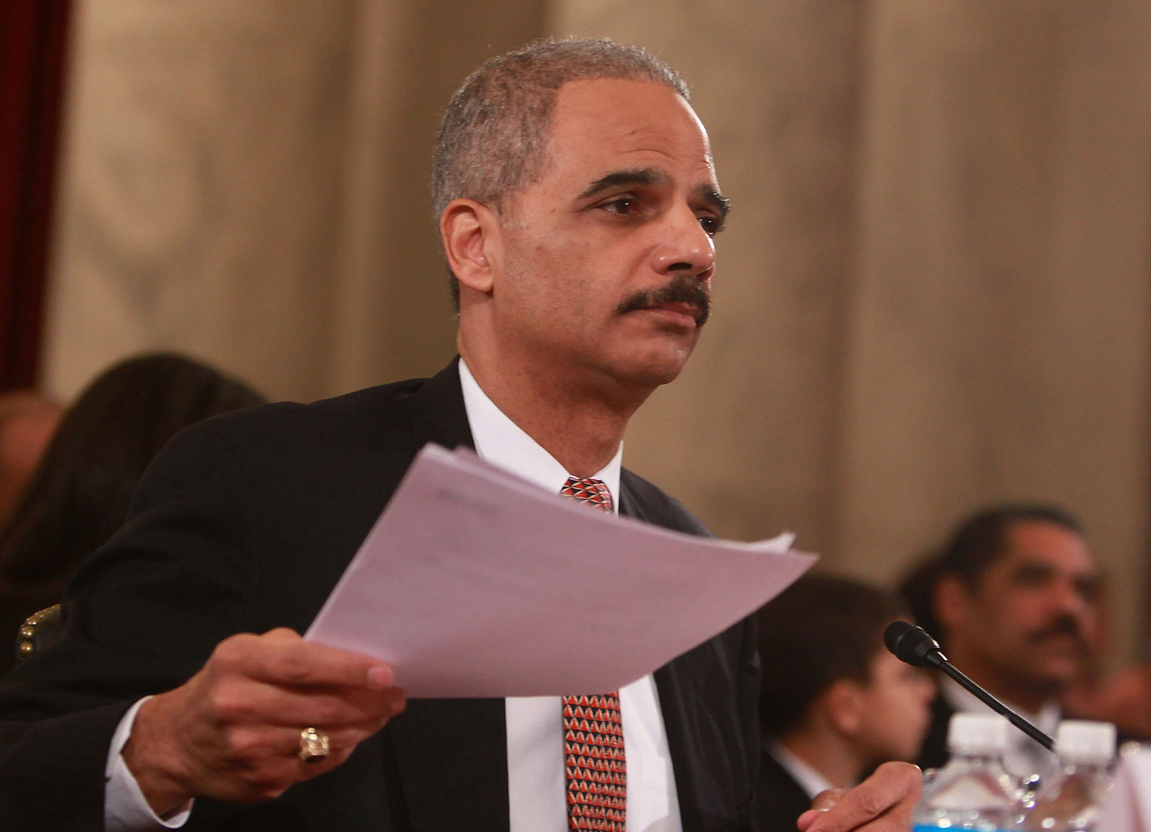 WASHINGTON - JANUARY 15: Attorney General nominee Eric Holder testifies during his confirmation hearing in front of the Senate Judiciary Committee on Capitol Hill on January 15, 2009 in Washington DC. Holder has been nominated by President Elect Barack Obama to be Attorney General and if confirmed will be the first African-American Attorney General of the U.S. (Photo by Mark Wilson/Getty Images)