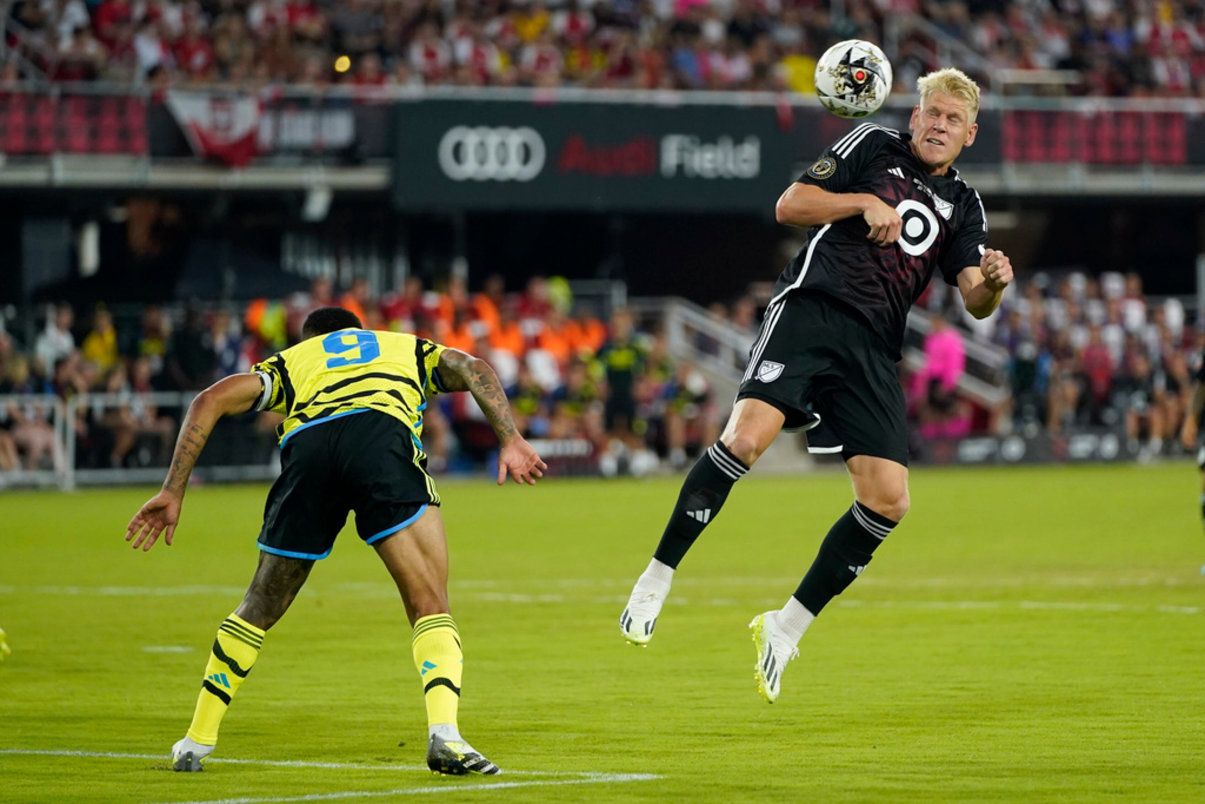Philadelphia Union defender Jakob Glesnes, right, heads a ball in front of Arsenal forward Gabriel Jesus in the first half of the MLS All-Star soccer match, Wednesday, July 19, 2023, in Washington. (AP Photo/Alex Brandon)