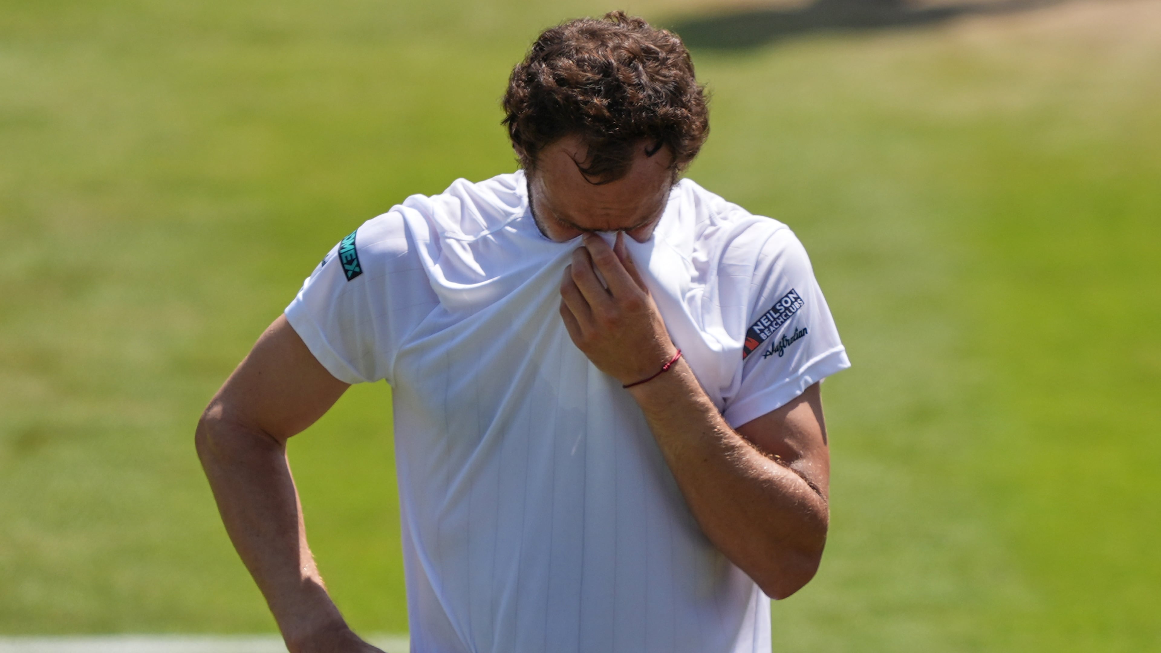 Roman Safiullin of Russia reacts winning the third round men's singles match against Joao Fonseca of Brazil at the Wimbledon Tennis Championships in London, Friday, July 3, 2026.(AP Photo/Maja Smiejkowska)