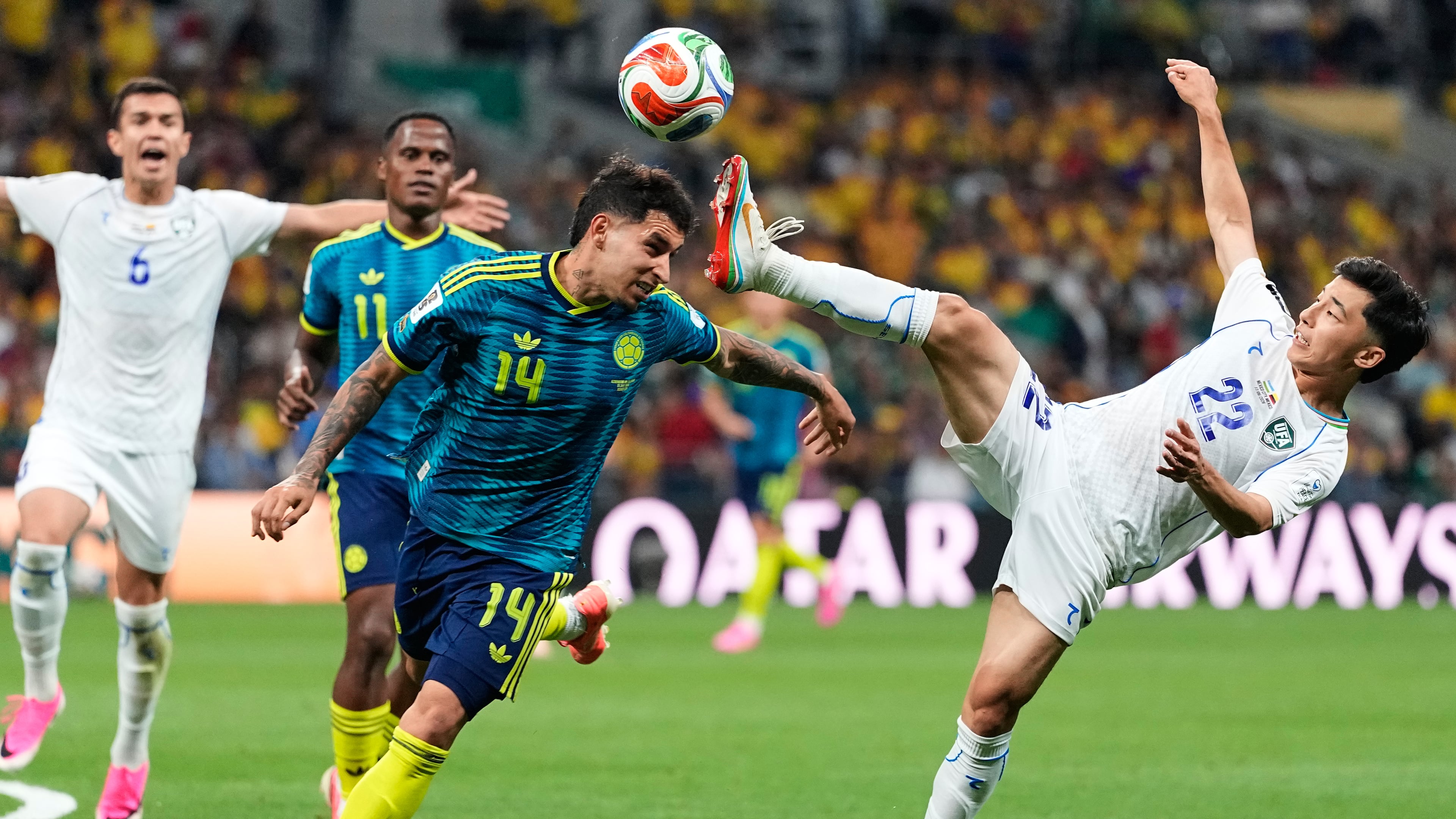 Uzbekistan's Abbosbek Fayzullaev (right) and Colombia's Gustavo Puerta compete for the ball during the World Cup Group K soccer match between Uzbekistan and Colombia in Mexico City, Wednesday, June 17, 2026. (Natacha Pisarenko/AP)