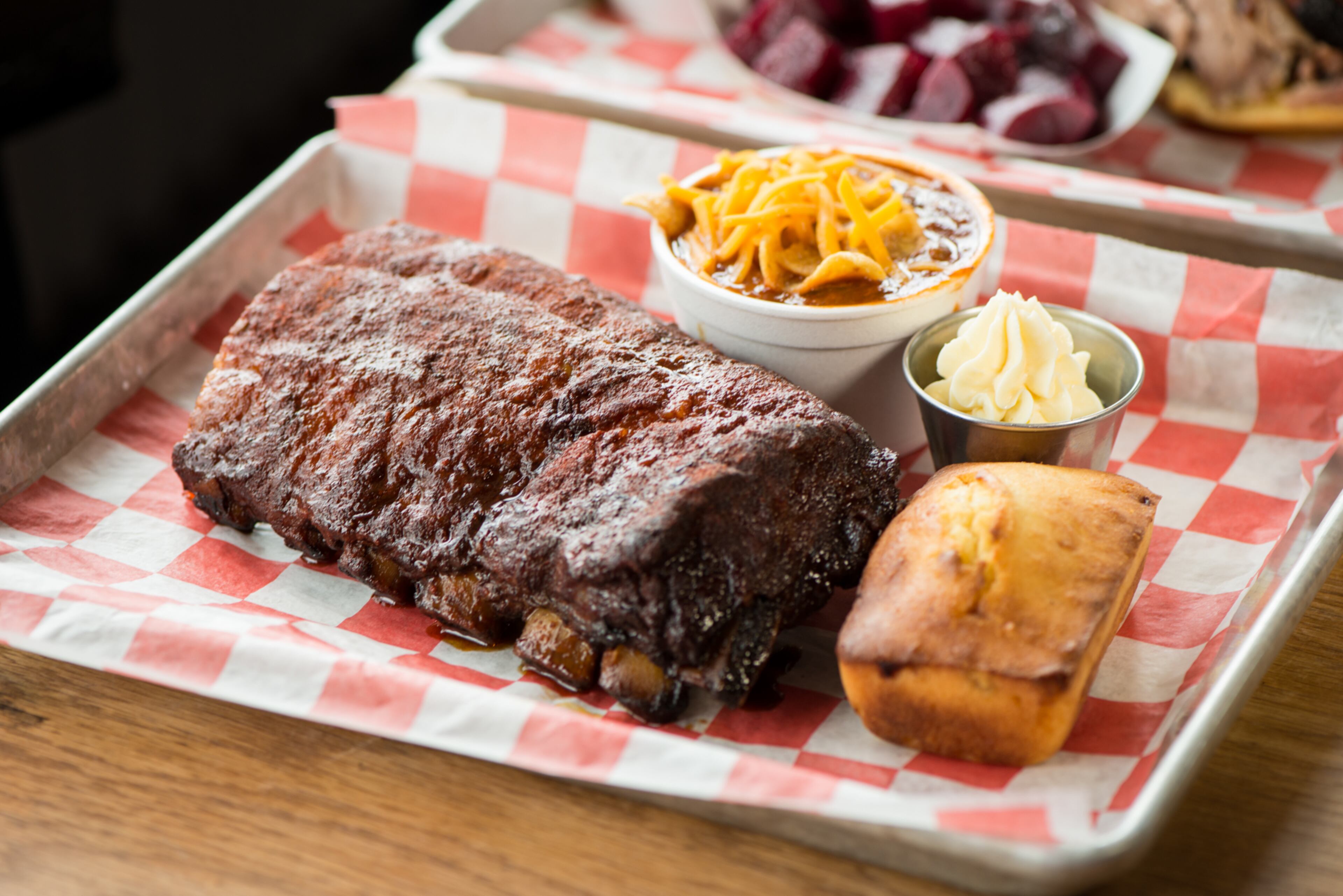 King Barbecue Baby Back Ribs Meat Plate with corn bread and brisket chili special. Photo credit- Mia Yakel.