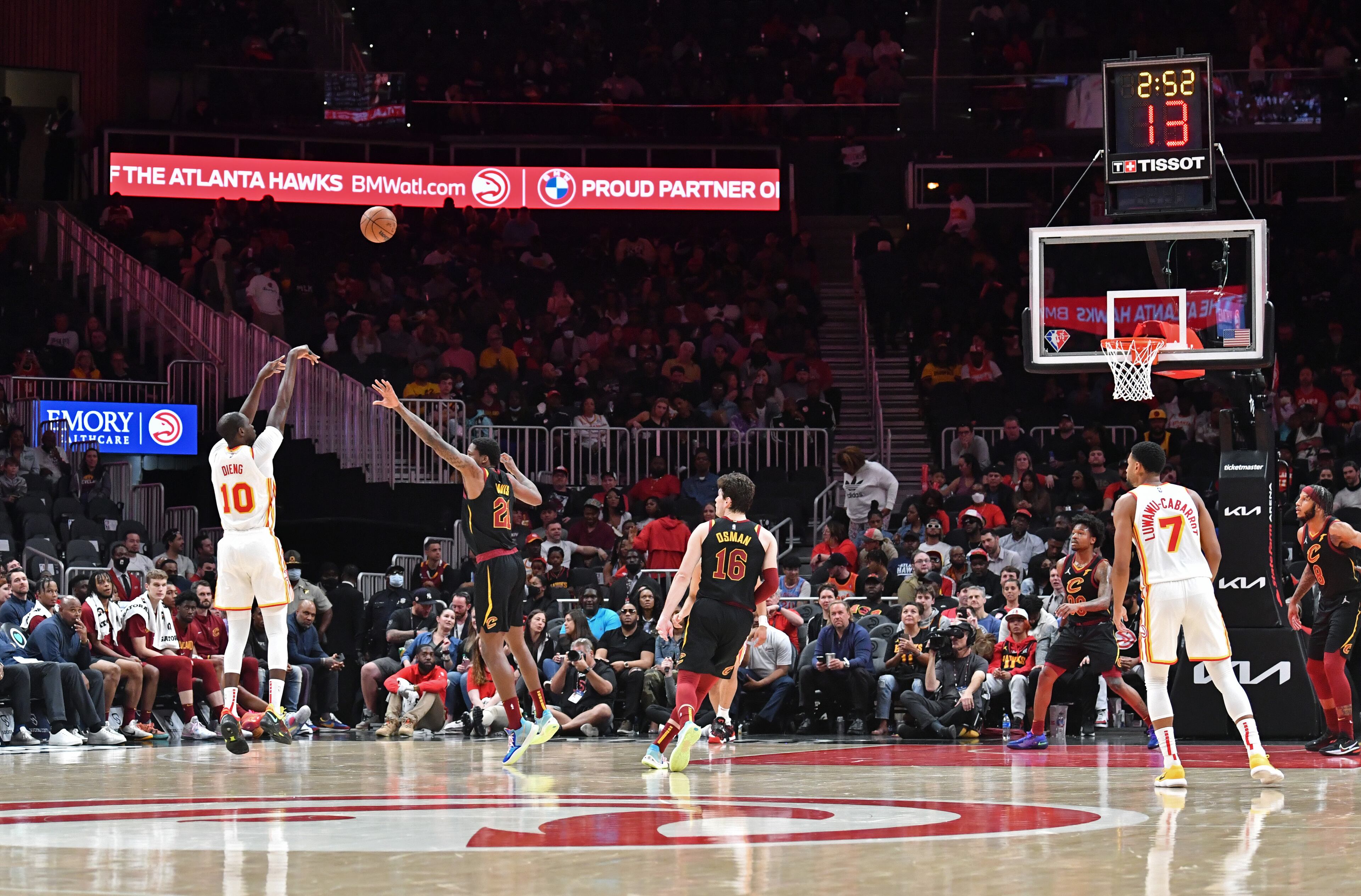Hawks' center Gorgui Dieng (10) shoots a 3-point basket during the second half in an NBA basketball game at State Farm Arena on Thursday, March 31, 2022. Atlanta Hawks won 131-107 over Cleveland Cavaliers. (Hyosub Shin / Hyosub.Shin@ajc.com)