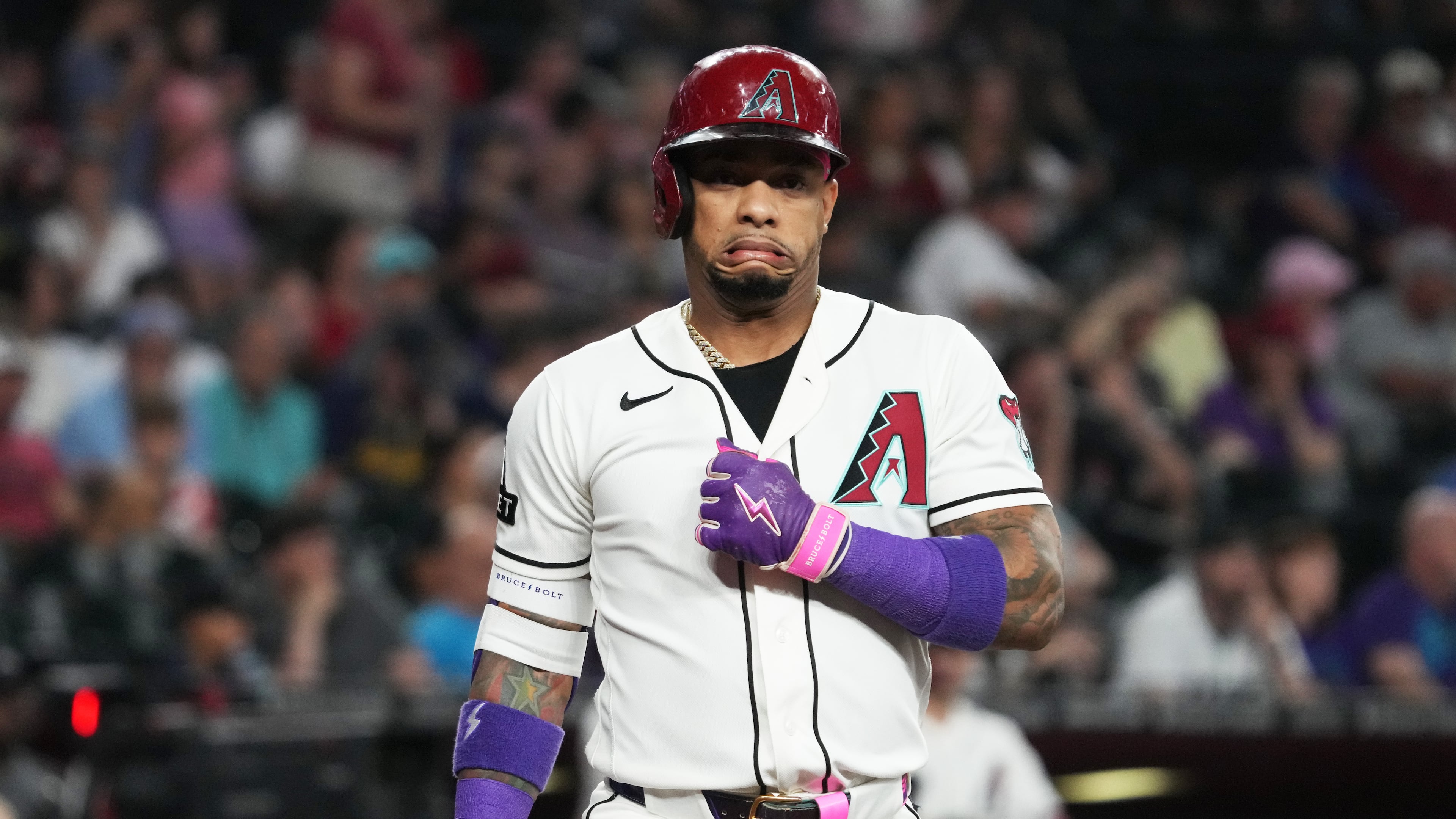Arizona Diamondbacks' Ketel Marte reacts after a wild pitch in the first inning of a baseball game against the Milwaukee Brewers, Sunday, July 5, 2026, in Phoenix. (AP Photo/Rick Scuteri)