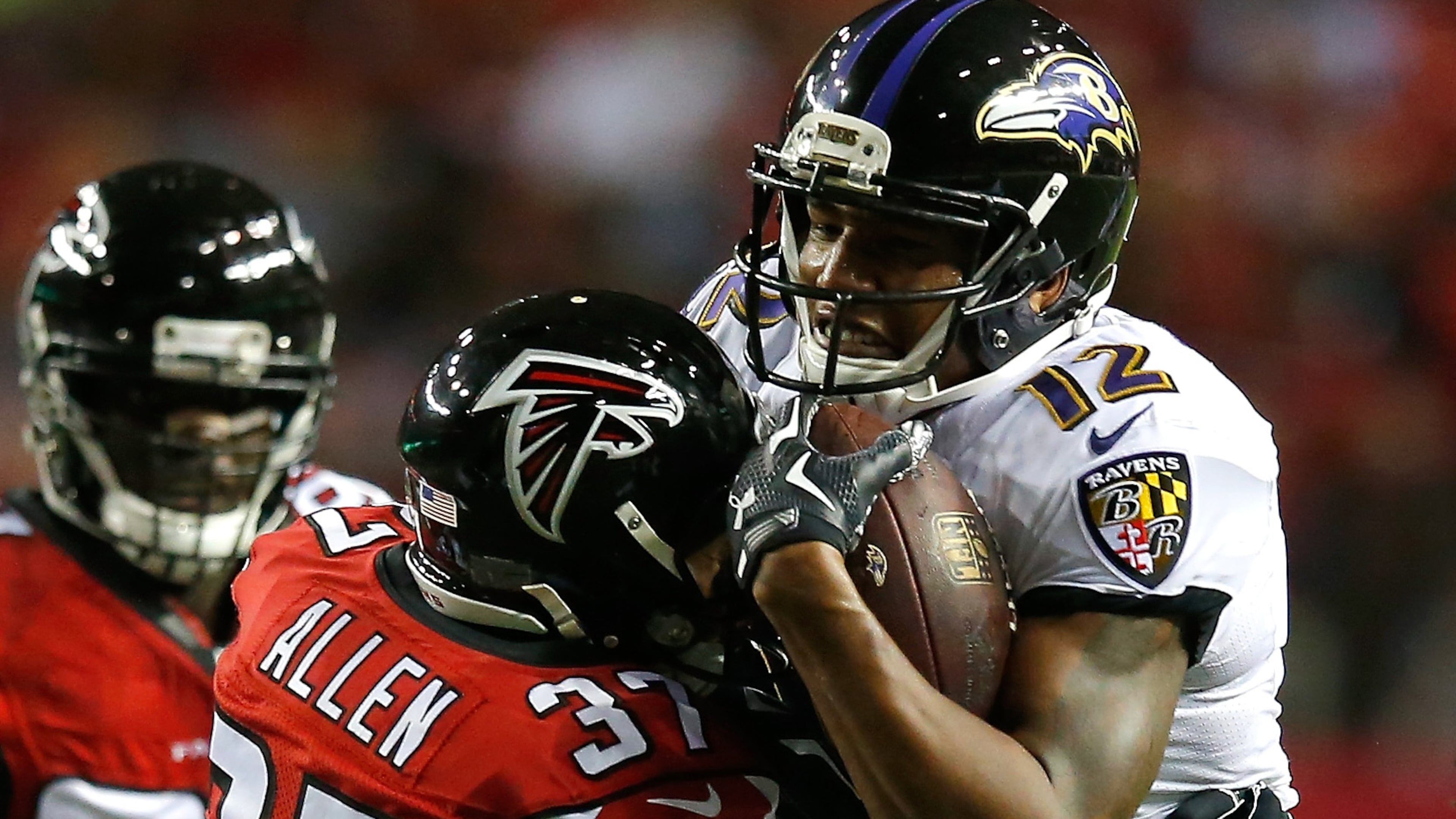 ATLANTA, GA - SEPTEMBER 03: Ricardo Allen #37 of the Atlanta Falcons tackles Darren Waller #12 of the Baltimore Ravens at Georgia Dome on September 3, 2015 in Atlanta, Georgia. (Photo by Kevin C. Cox/Getty Images)