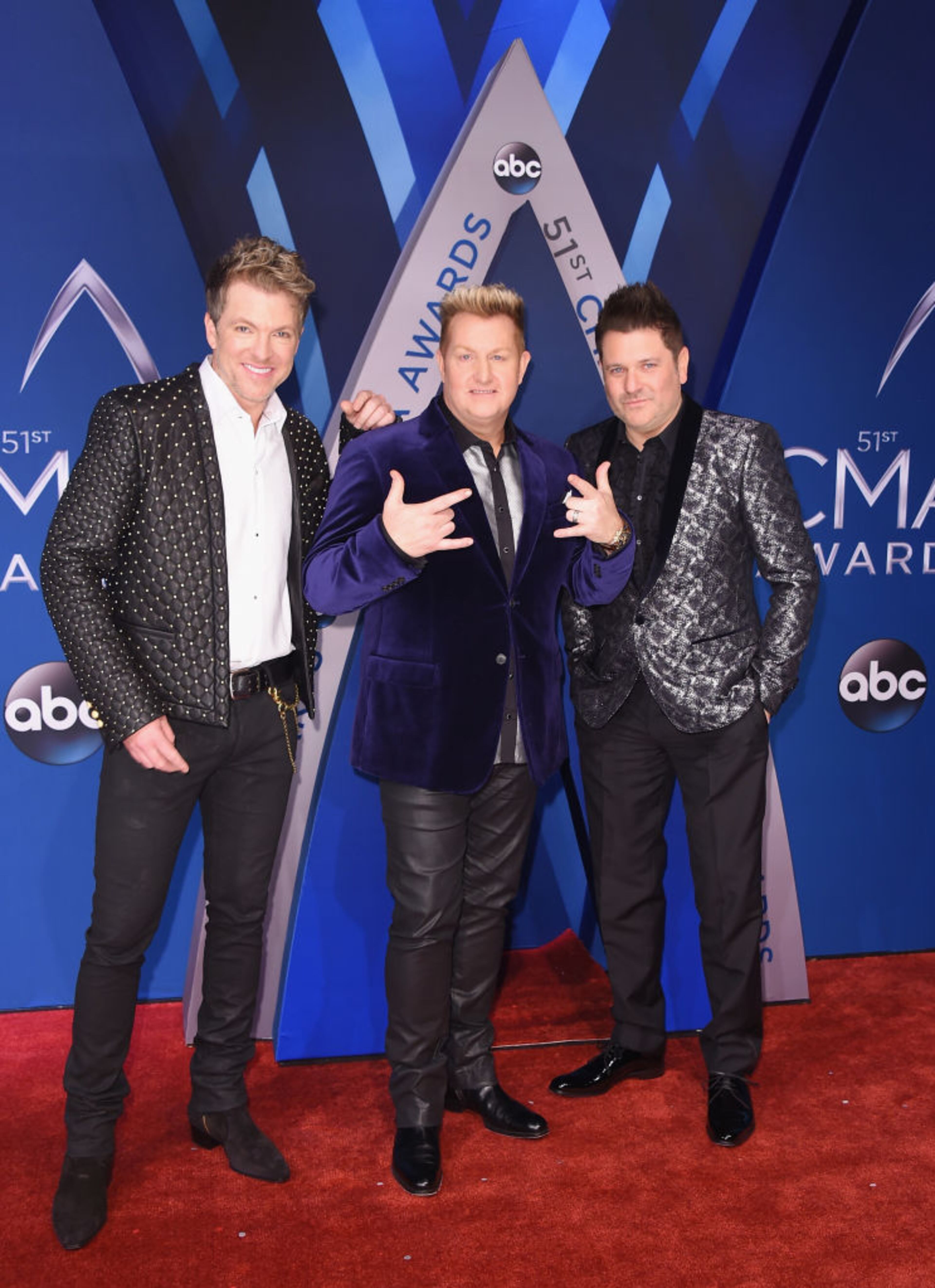 NASHVILLE, TN - NOVEMBER 08: (L-R) Joe Don Rooney, Gary LeVox and Jay DeMarcus of Rascal Flatts attend the 51st annual CMA Awards at the Bridgestone Arena on November 8, 2017 in Nashville, Tennessee. (Photo by Michael Loccisano/Getty Images)