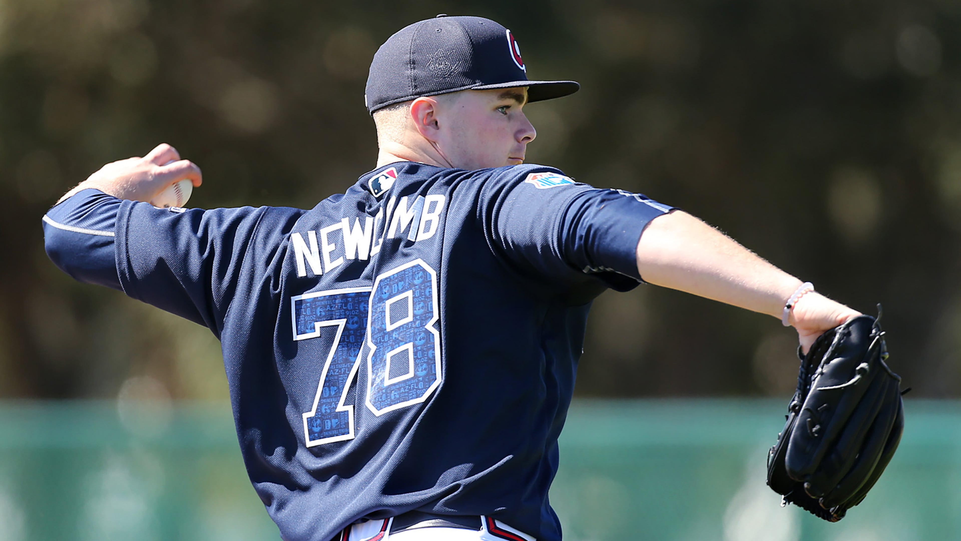 022716 LAKE BUENA VISTA: Braves pitcher Sean Newcomb throws to first during pitching drills at spring training on Saturday, Feb 27, 2016, at the ESPN Wide World of Sports, Lake Buena Vista, FL. Curtis Compton / ccompton@ajc.com