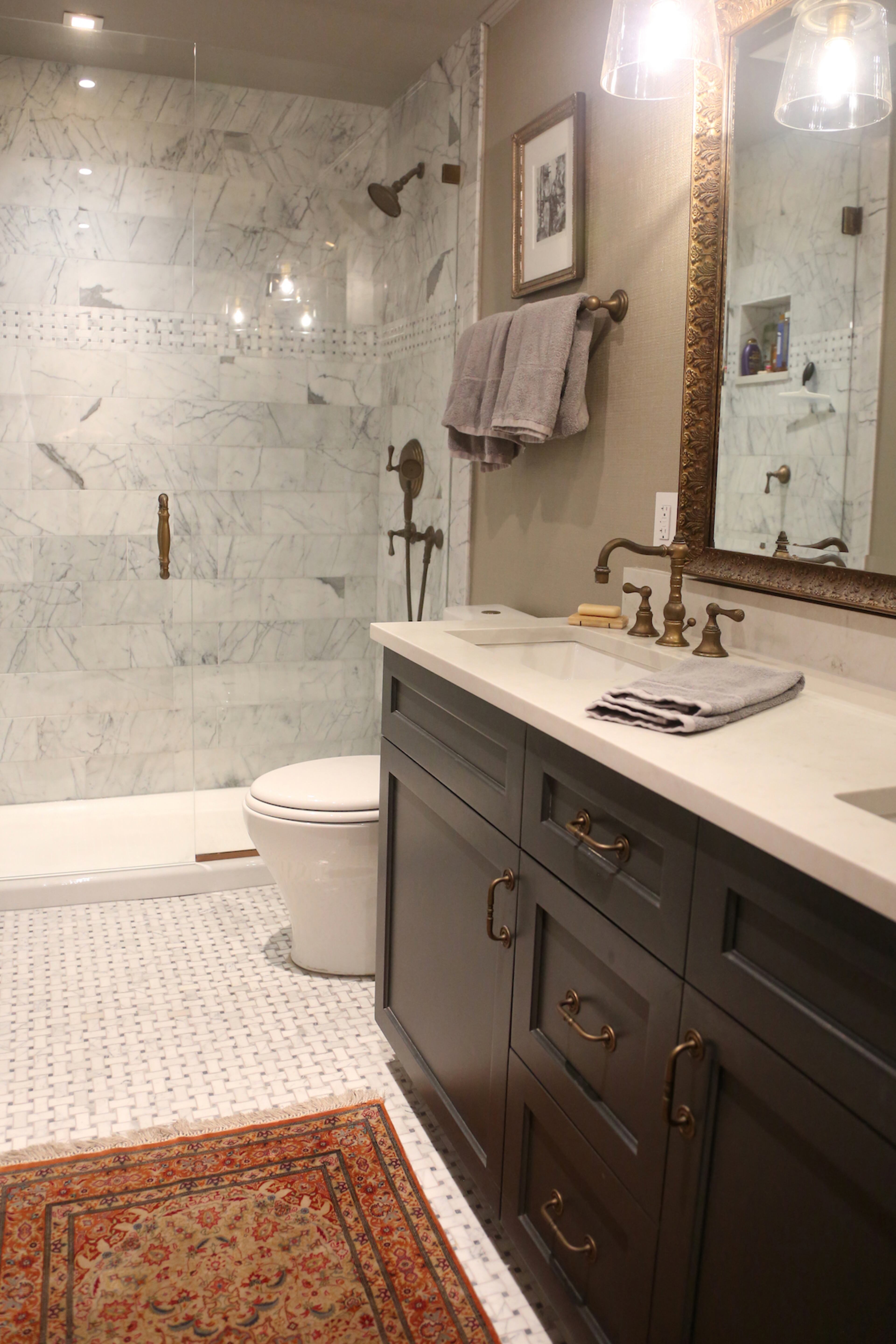 Tile from Moda Floors & Interiors and hardware from Cifial are part of the bathroom makeover in the Buckhead condo.