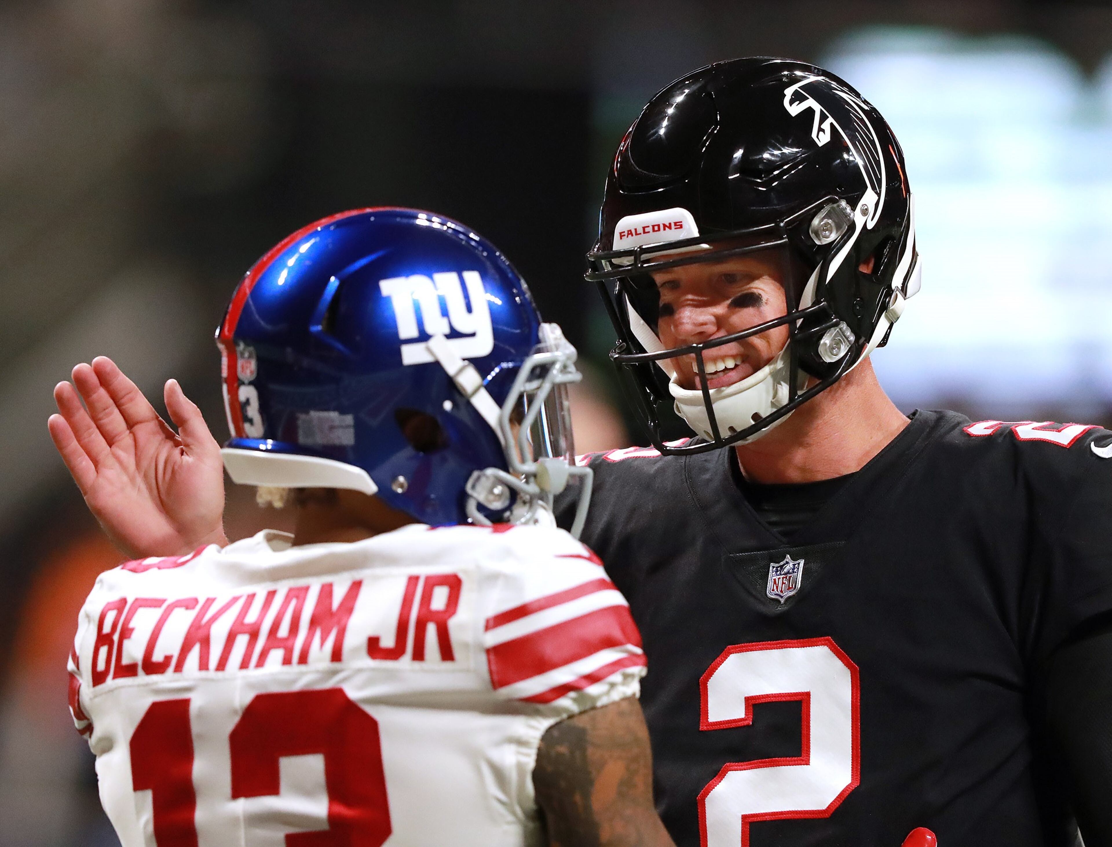 October 22, 2018 Atlanta: Atlanta Falcons quarterback Matt Ryan and New York Giants wide receiver Odell Beckham Jr. greet each other on the field before facing off in a NFL football game on Monday, Oct 22, 2018, in Atlanta. Curtis Compton/ccompton@ajc.com