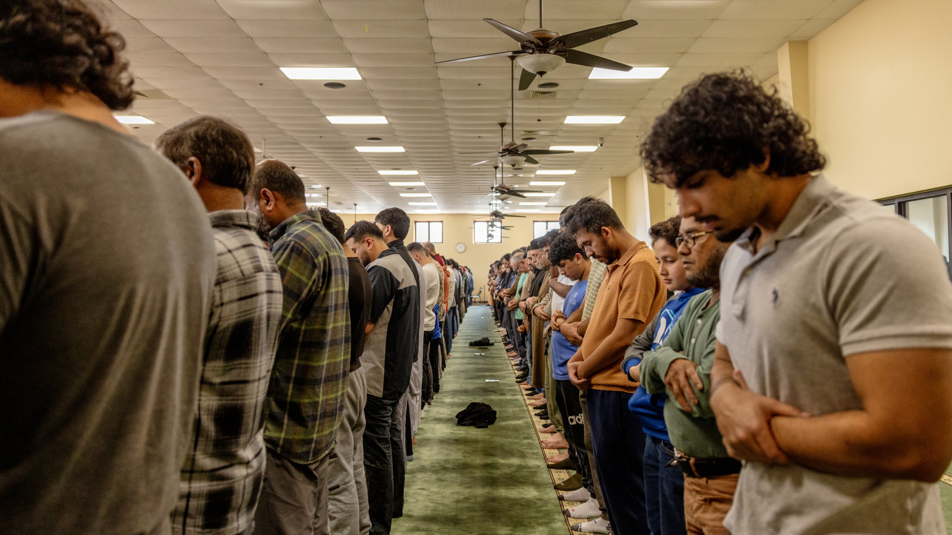 FILE - People pray at the Islamic Society of Tulsa, Friday, Feb. 13, 2026, in Tulsa, Okla. (AP Photo/Brittany Bendabout, File)