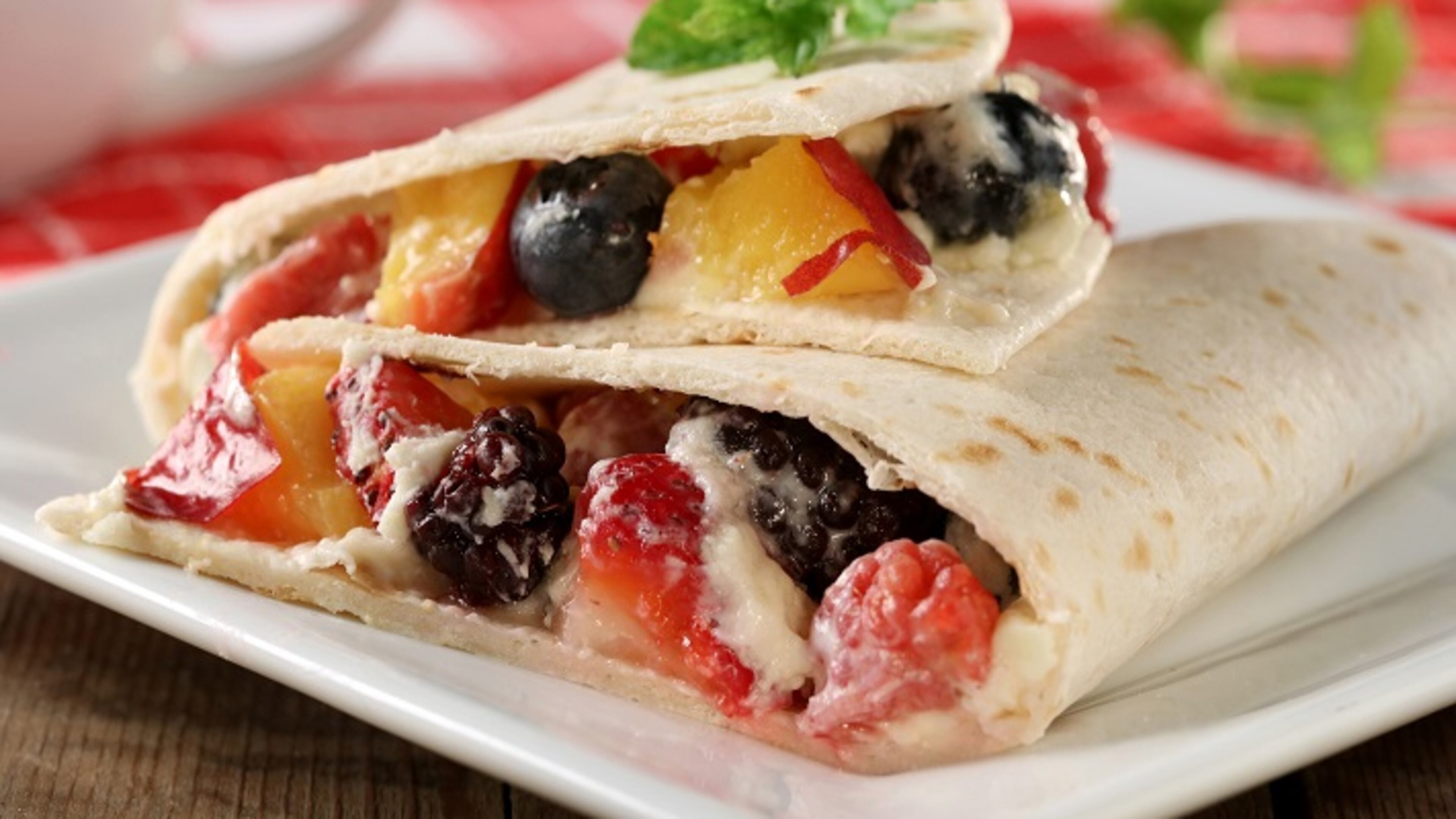 Dessert quesadillas: Spread the tortilla with marscapone then add your choice of sliced fruit or berries, such as this nectarine, strawberry and blueberry combo. (Michael Tercha/Chicago Tribune/TNS)