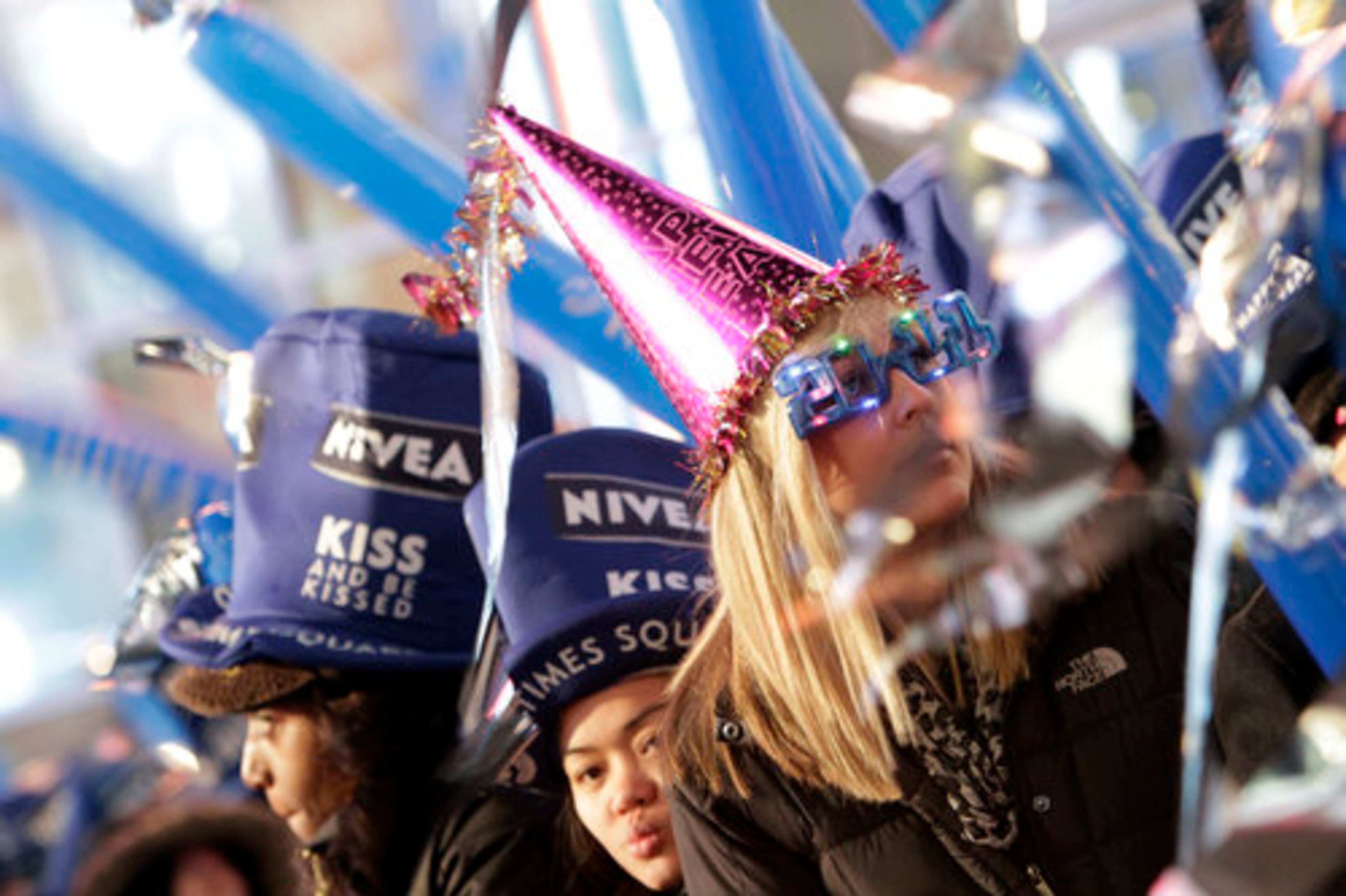 Caroline Meuller of Leawood, Kansas, watches the performance during the New Year's Eve celebration in New York's Times Square, Saturday, Jan. 1, 2011.
