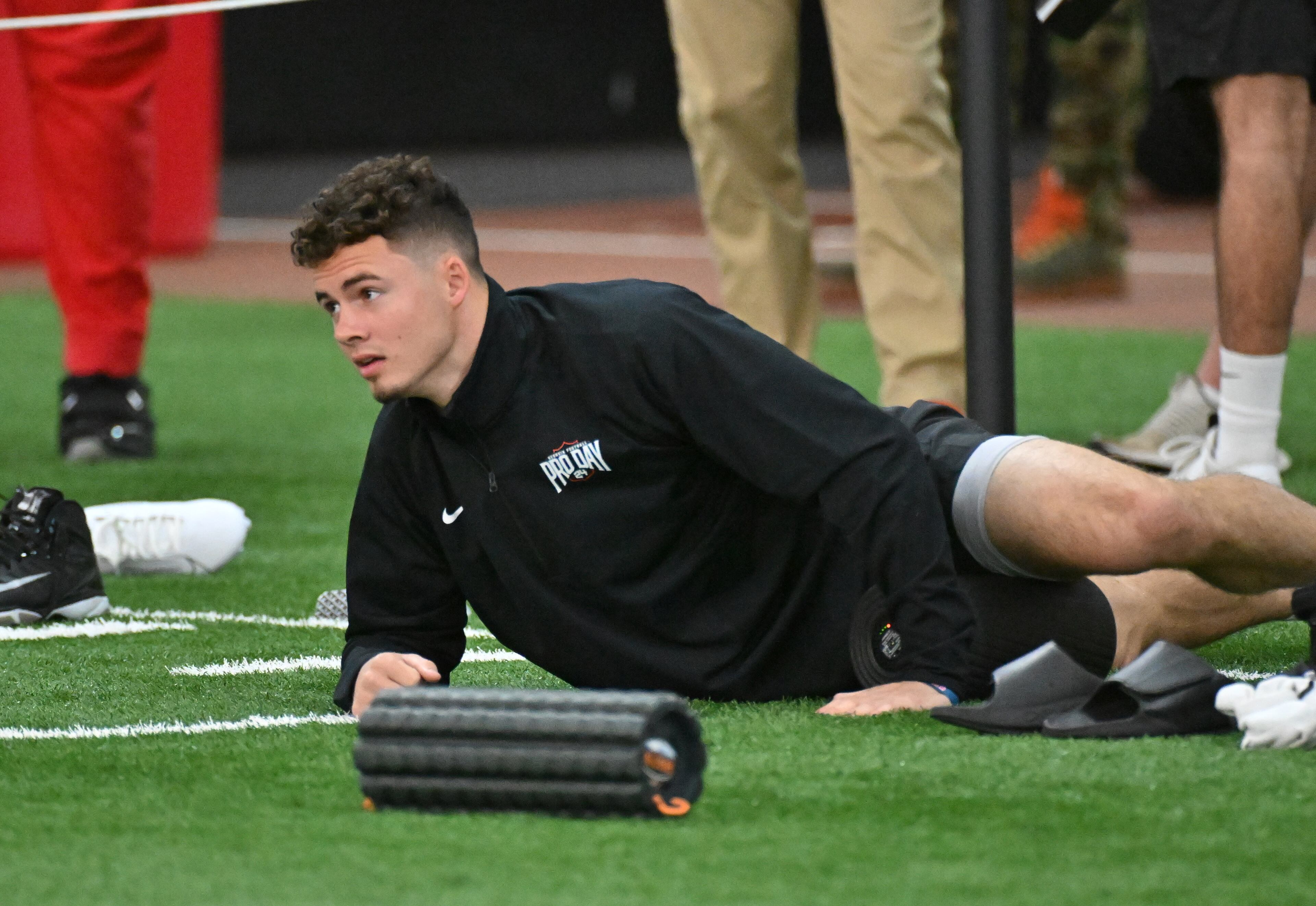 Georgia wide receiver Ladd McConkey stetches during Georgia Pro Day at Payne Indoor Athletic Facility, Wednesday, Mar. 13, 2024, in Athens. (Hyosub Shin / Hyosub.Shin@ajc.com)