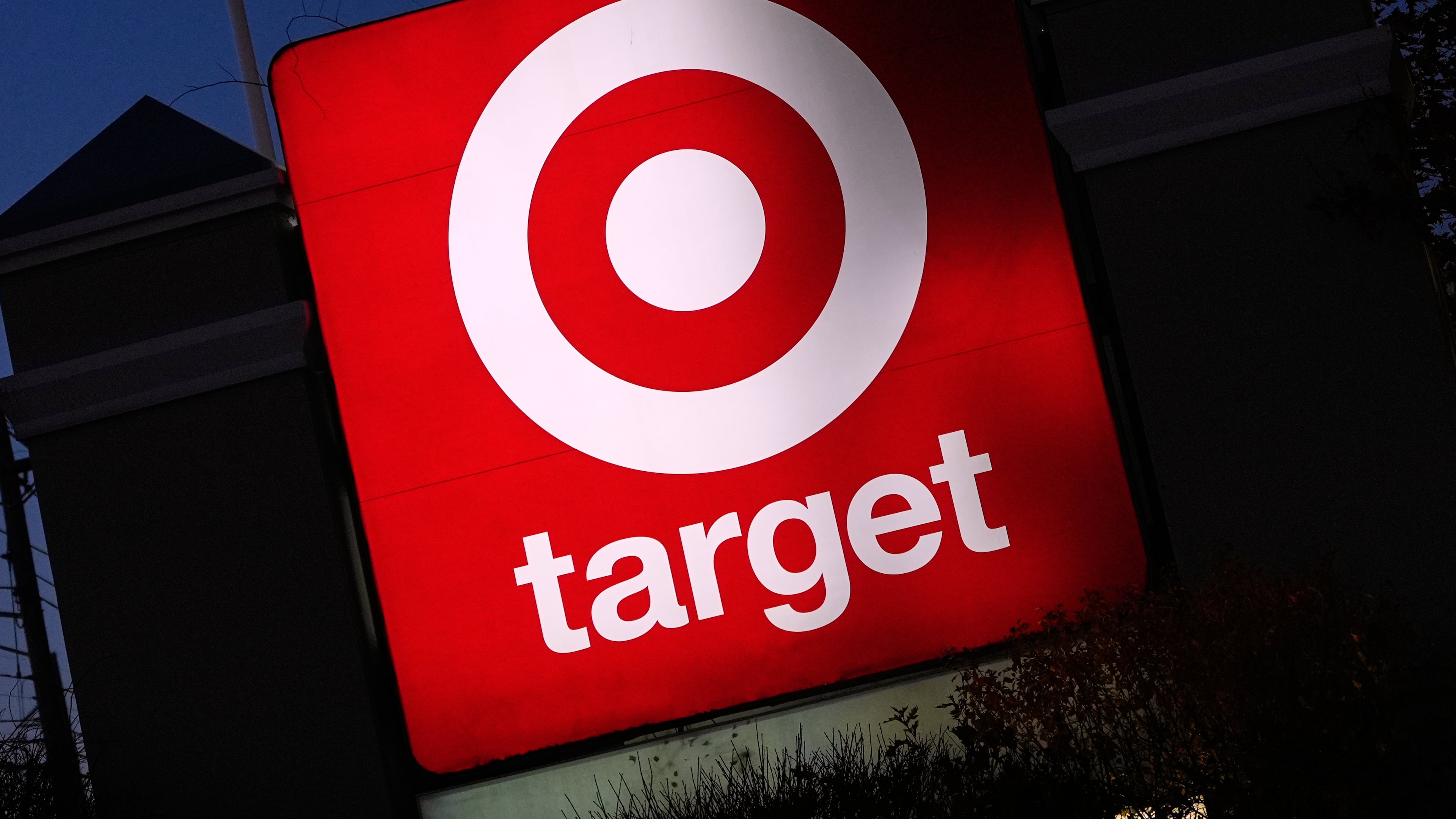 FILE - The Target logo displayed on a sign outside a store, Nov. 18, 2025, in Salem, N.H. (AP Photo/Charles Krupa, File)