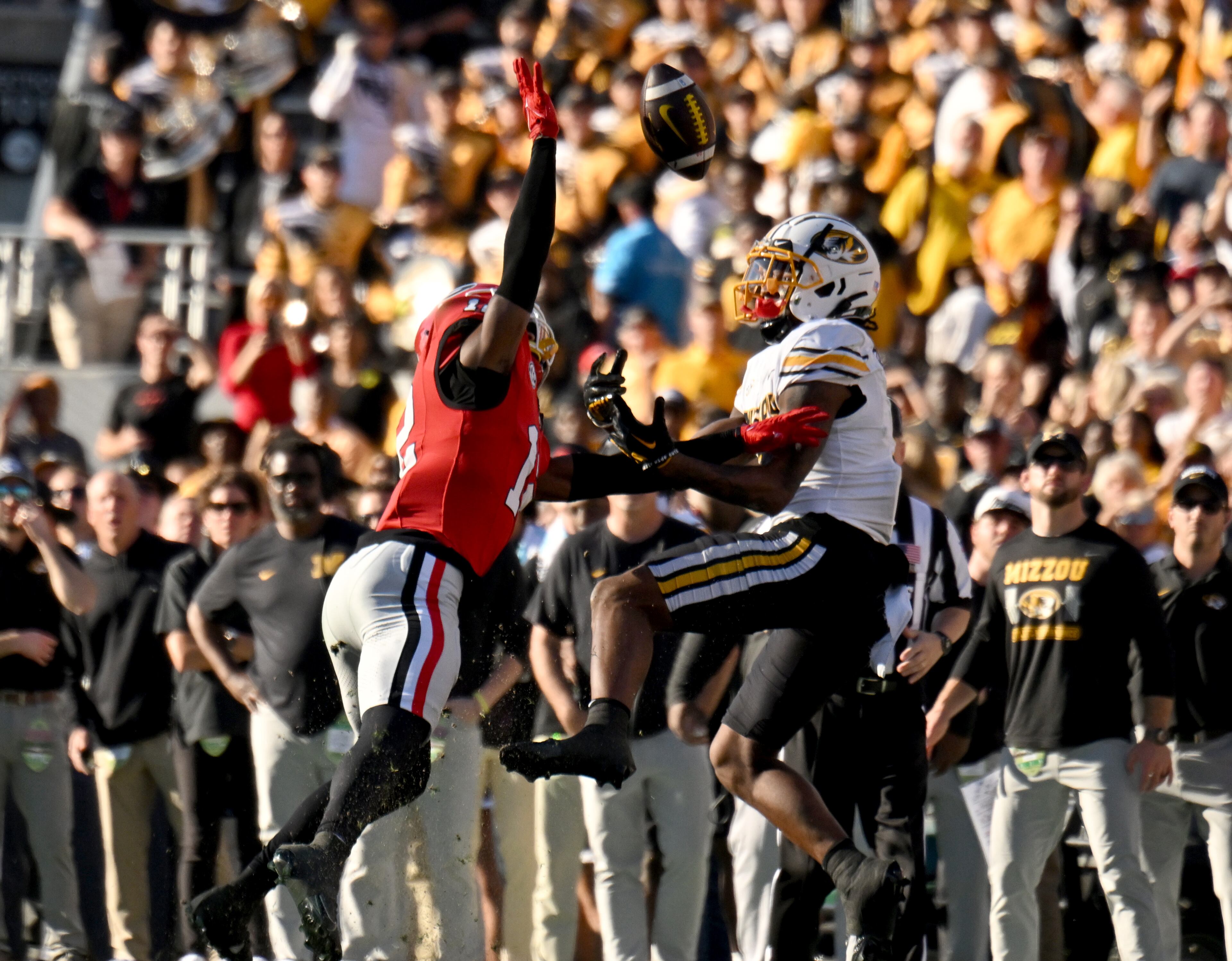 Missouri wide receiver Luther Burden III (3) is not able to catch under pressure from Georgia defensive back Julian Humphrey (12) during the first half in an NCAA football game at Sanford Stadium, Saturday, November 4, 2023, in Athens. (Hyosub Shin / Hyosub.Shin@ajc.com)