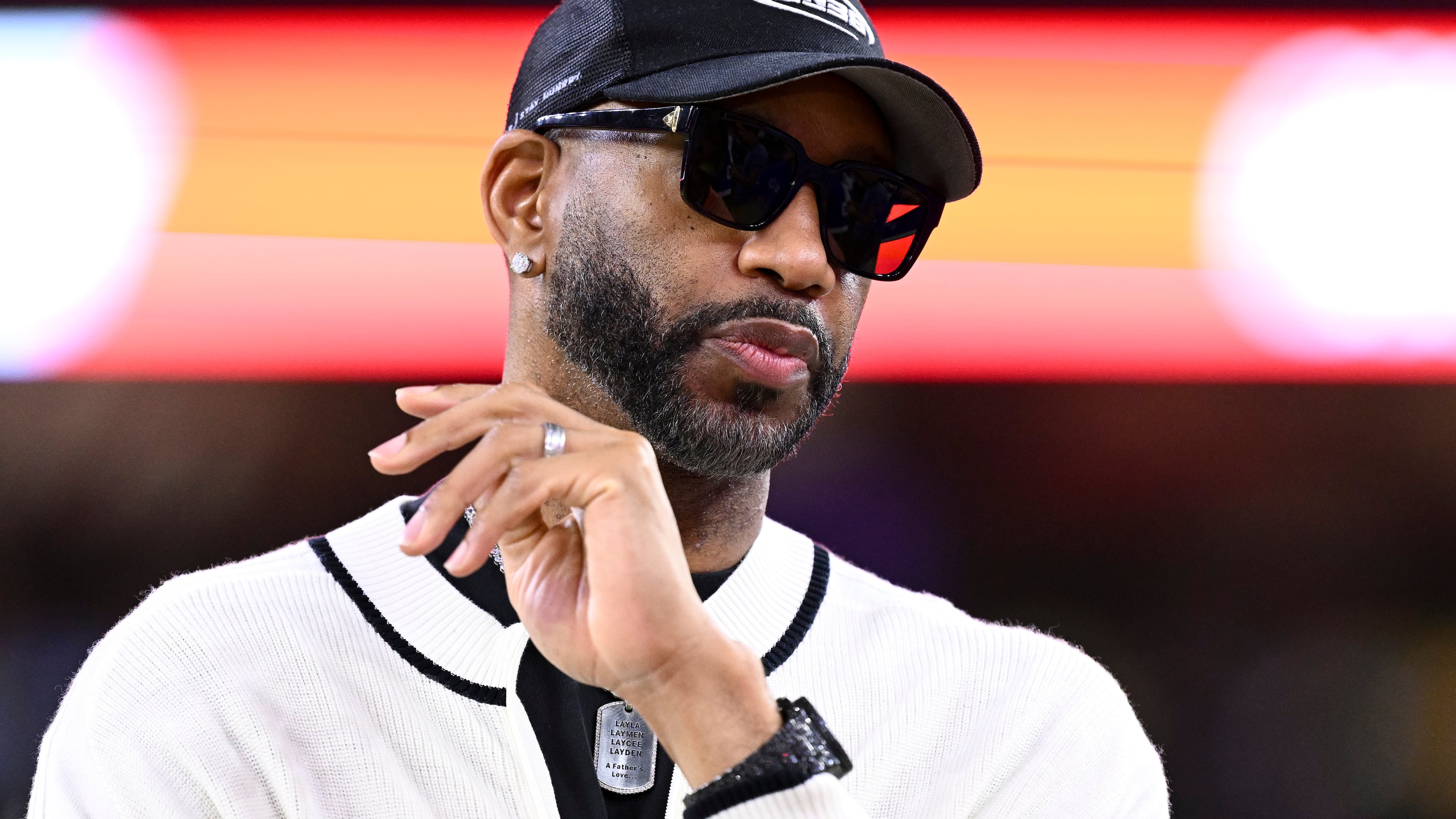 FILE - Basketball Hall of Famer Tracy McGrady stands on the sideline prior an NFL football game between the Houston Texans and the Buffalo Bills, Nov. 20, 2025, in Houston. (AP Photo/Maria Lysaker, File)