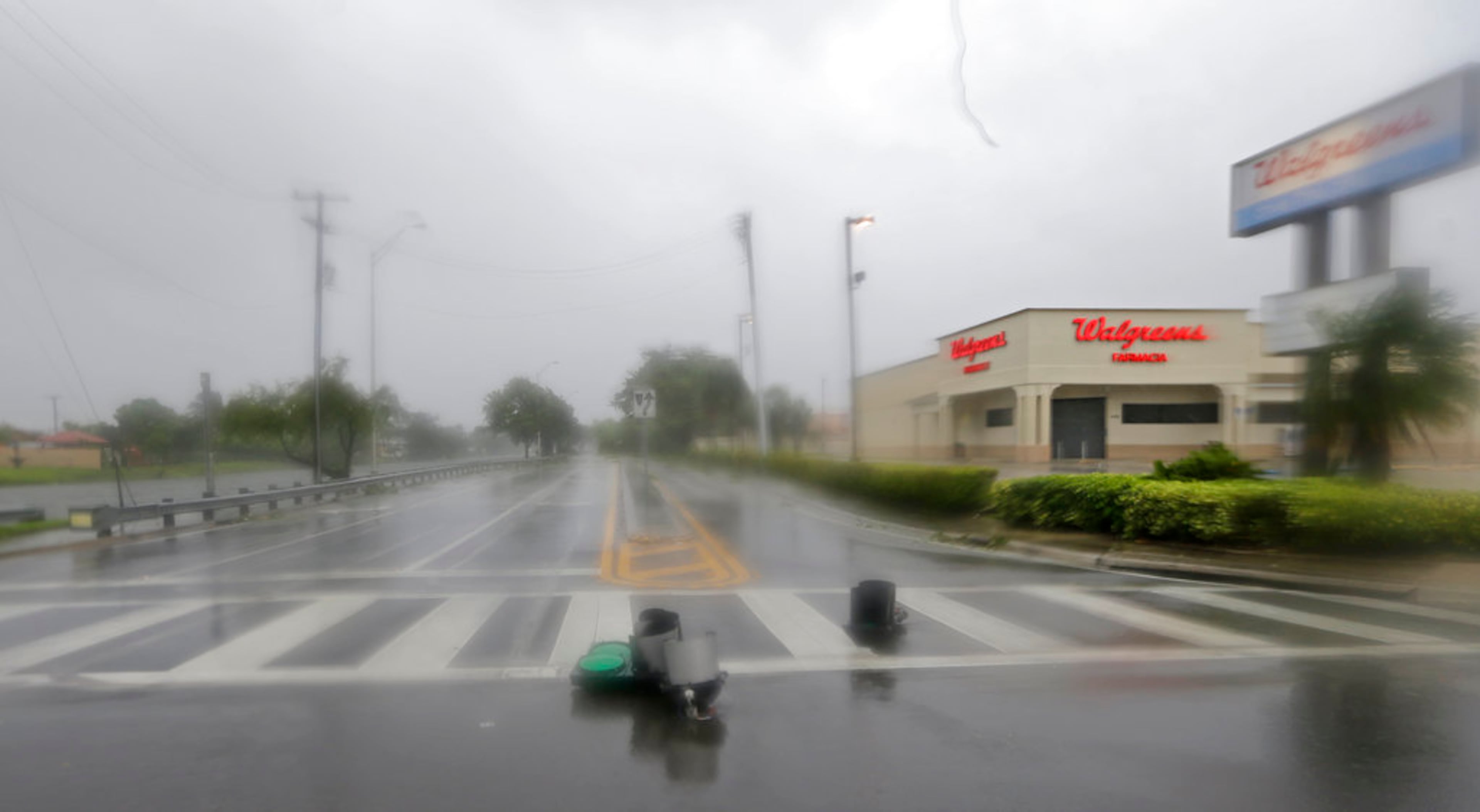 A downed traffic light appears on a street in Hialeah, Fla., on Sunday, Sept. 10, 2017. Wind gusts of 82 mph were reported in Miami, as Hurricane Irma bears down on the Florida Keys. (AP Photo/Alan Diaz)