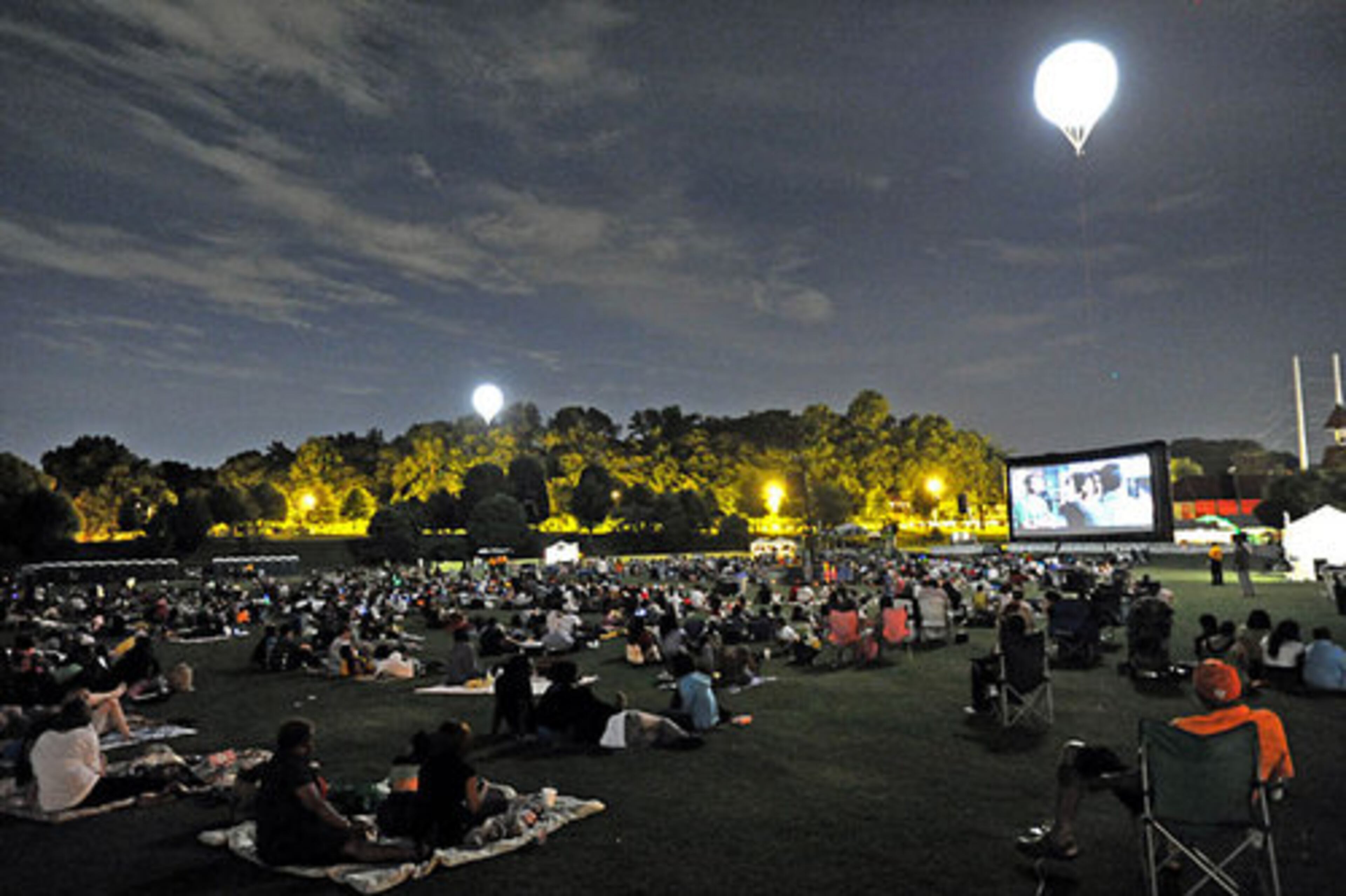 A smaller than usual crowd watched "Dreamgirls" during Screen on the Green at Piedmont Park in Atlanta. Screen on the Green resumed on Thursday night with increased security personnel. Showings were temporarily suspended after fights disrupted during the June 3 screening of "Transformers: Revenge of the Fallen."