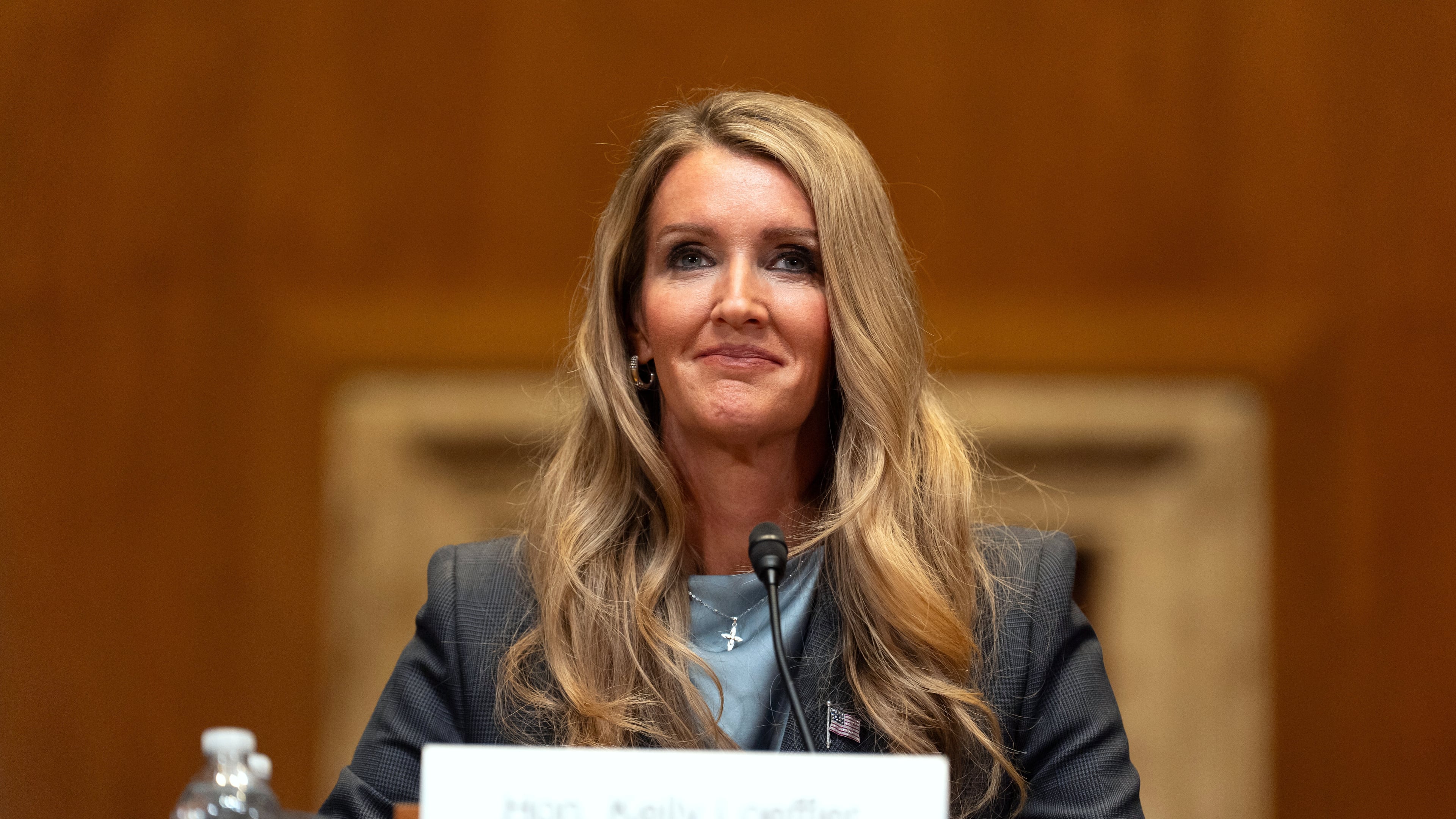 FILE - Small Business Administration administrator Kelly Loeffler listens during a hearing of the Senate Committee on Capitol Hill, May 21, 2025, in Washington. (AP Photo/Mark Schiefelbein, File)