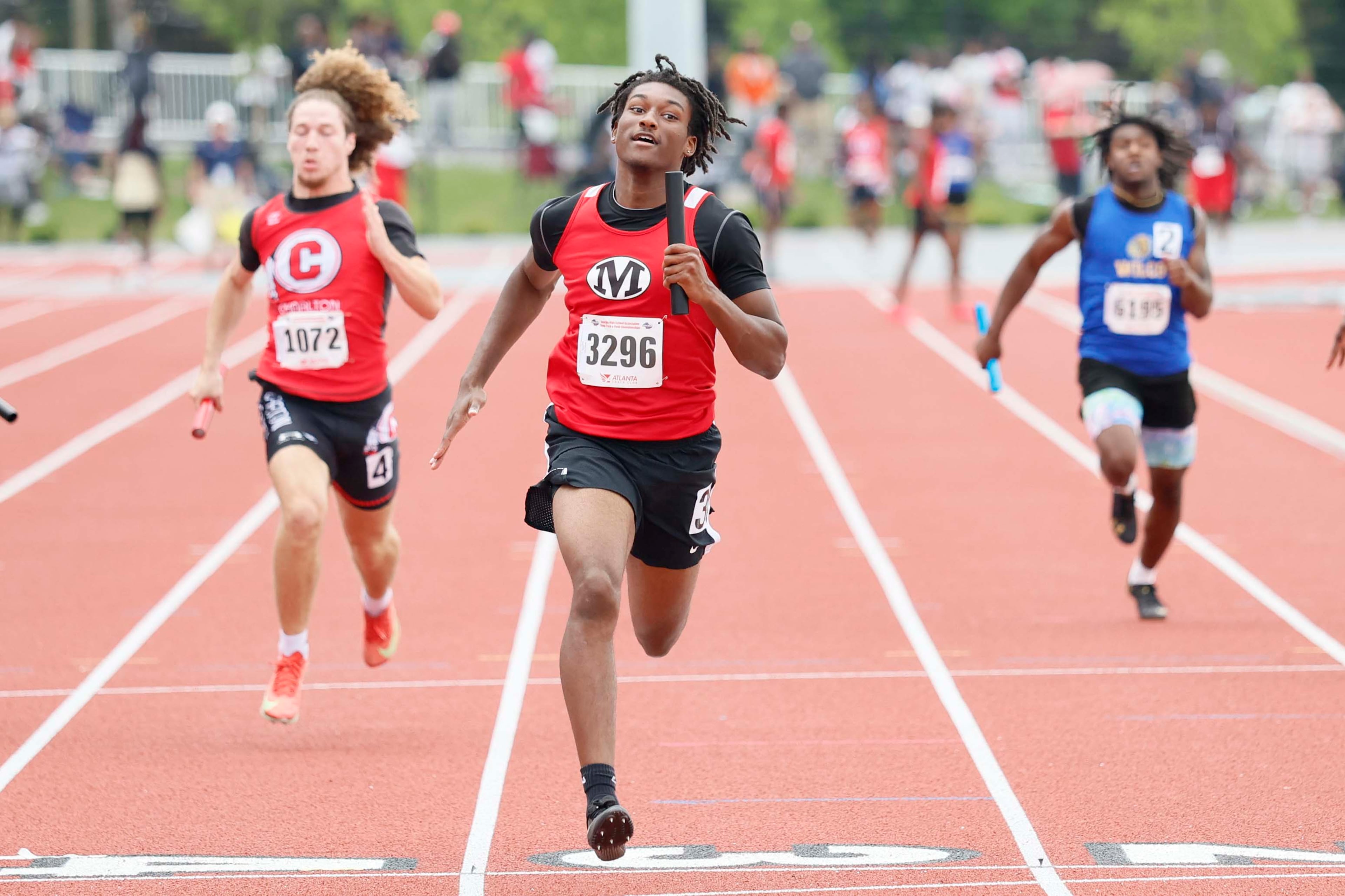 Marion County High School athlete crosses the finish line during the Boys 4x100 Meter Relay 1A Division 2 section 1 at the GHSA track and field state championship at UGA Spec Towns Track on Monday, May 11, 2026, in Athens.
(Miguel Martinez/AJC)