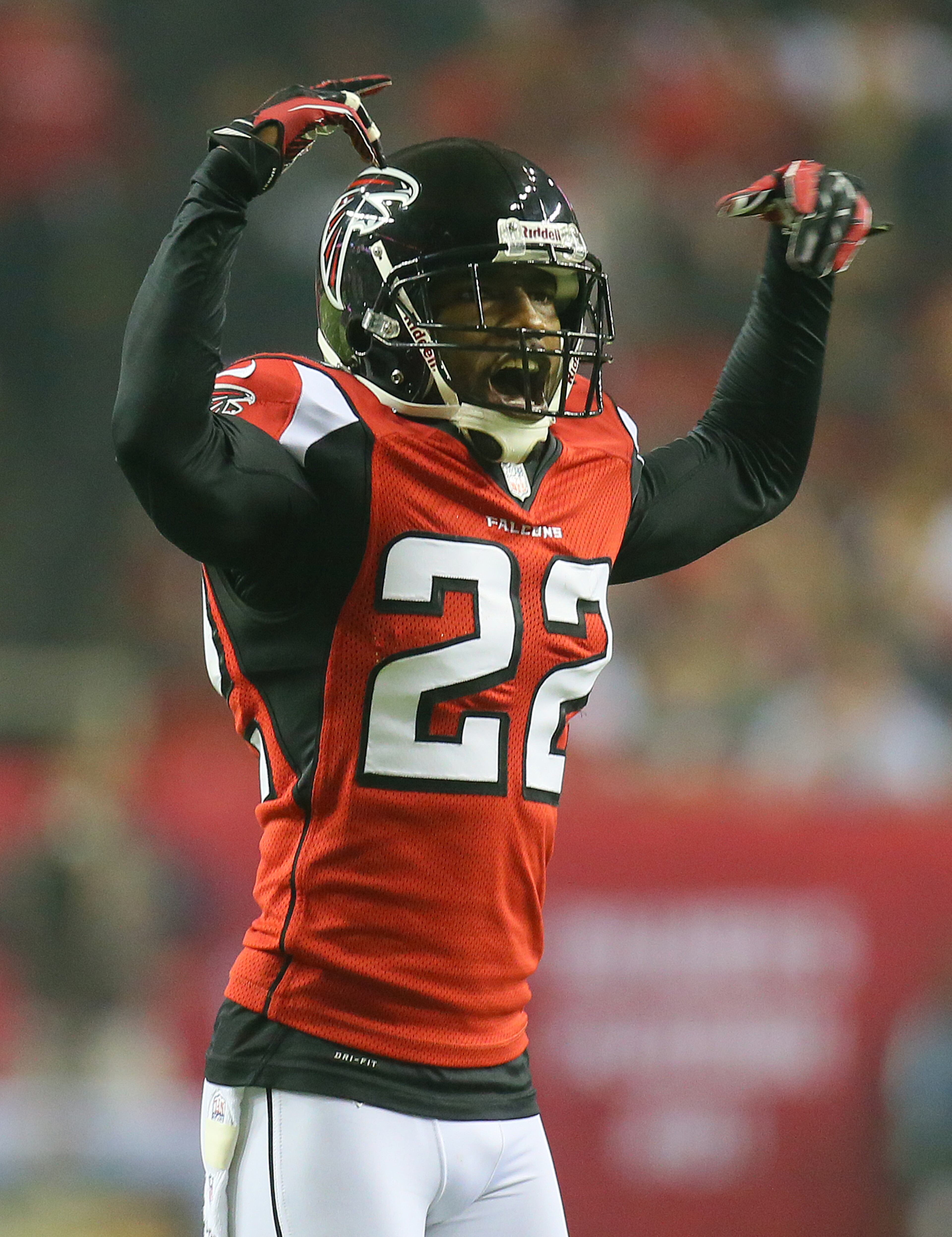 110412 ATLANTA: Falcons cornerback Asante Samuel gets the crowd fired up during fourth quarter action against the Cowboys at the Georgia Dome in Atlanta on Sunday, Nov. 4, 2012. CURTIS COMPTON / CCOMPTON@AJC.COM