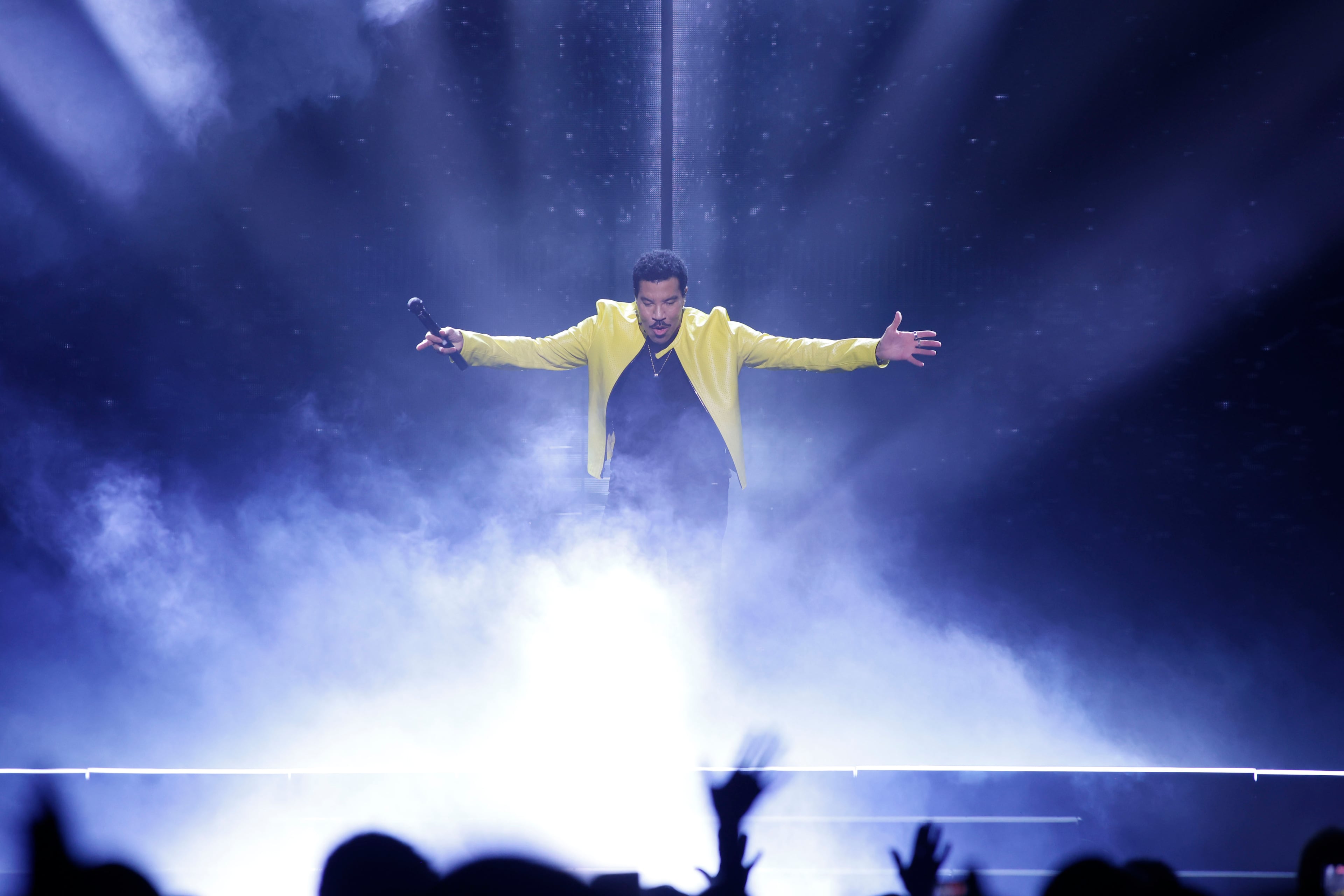 Lionel Richie makes a dramatic entrance Sunday, July 19, 2026, at State Farm Arena. (Akili-Casundria Ramsess for the AJC)