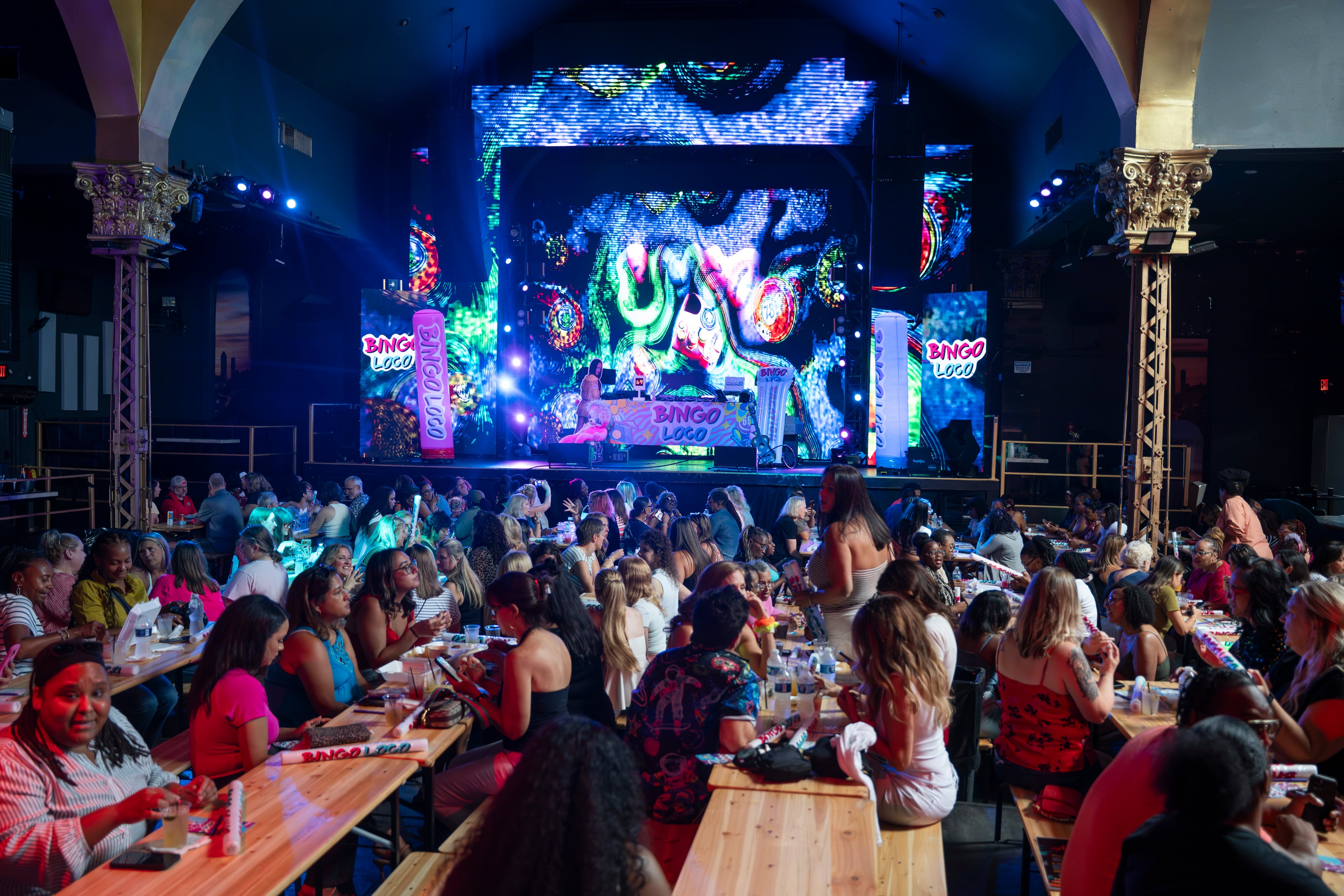 Players gather for Bingo Loco, a touring bingo rave party, at Believe Music Hall in Atlanta on Saturday, July 18, 2026. (Olivia Bowdoin for the AJC)