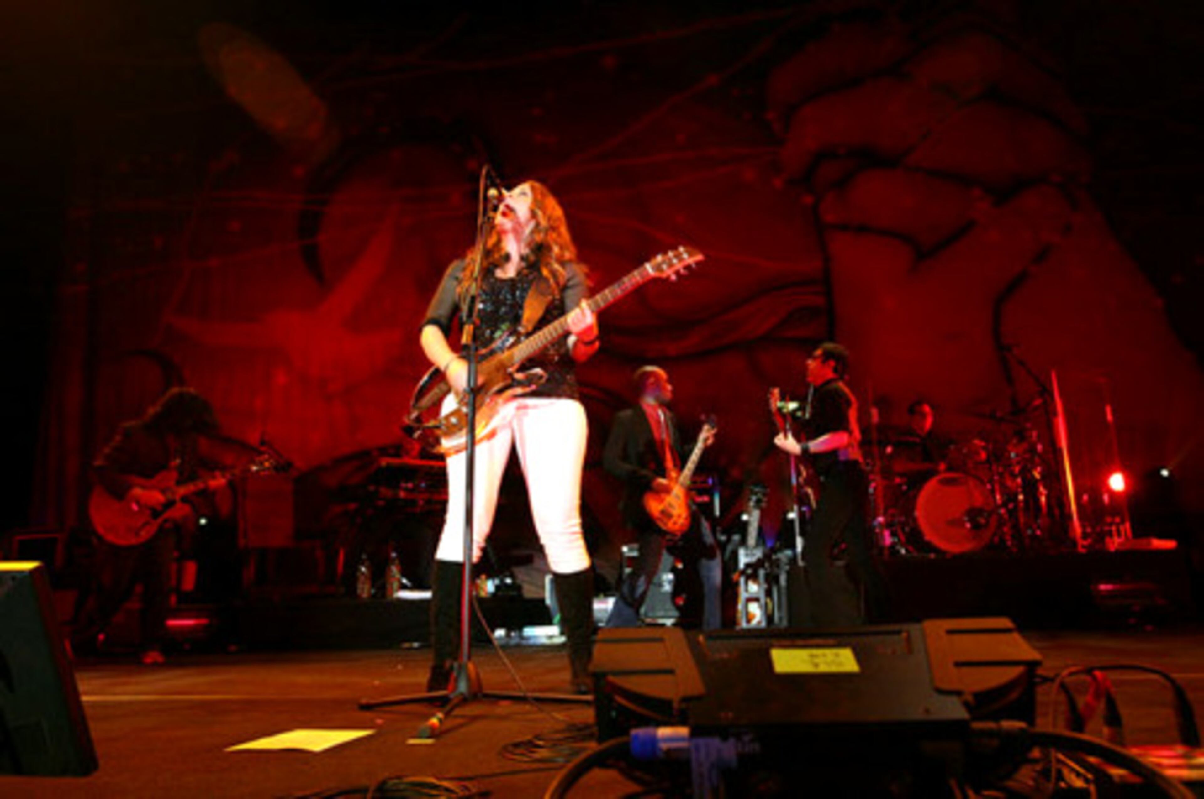 Alanis Morissette sings "Uninvited." She has won 12 Juno Awards (Canada's music awards) and seven Grammy Awards, and she as sold more than 40 million albums worldwide.