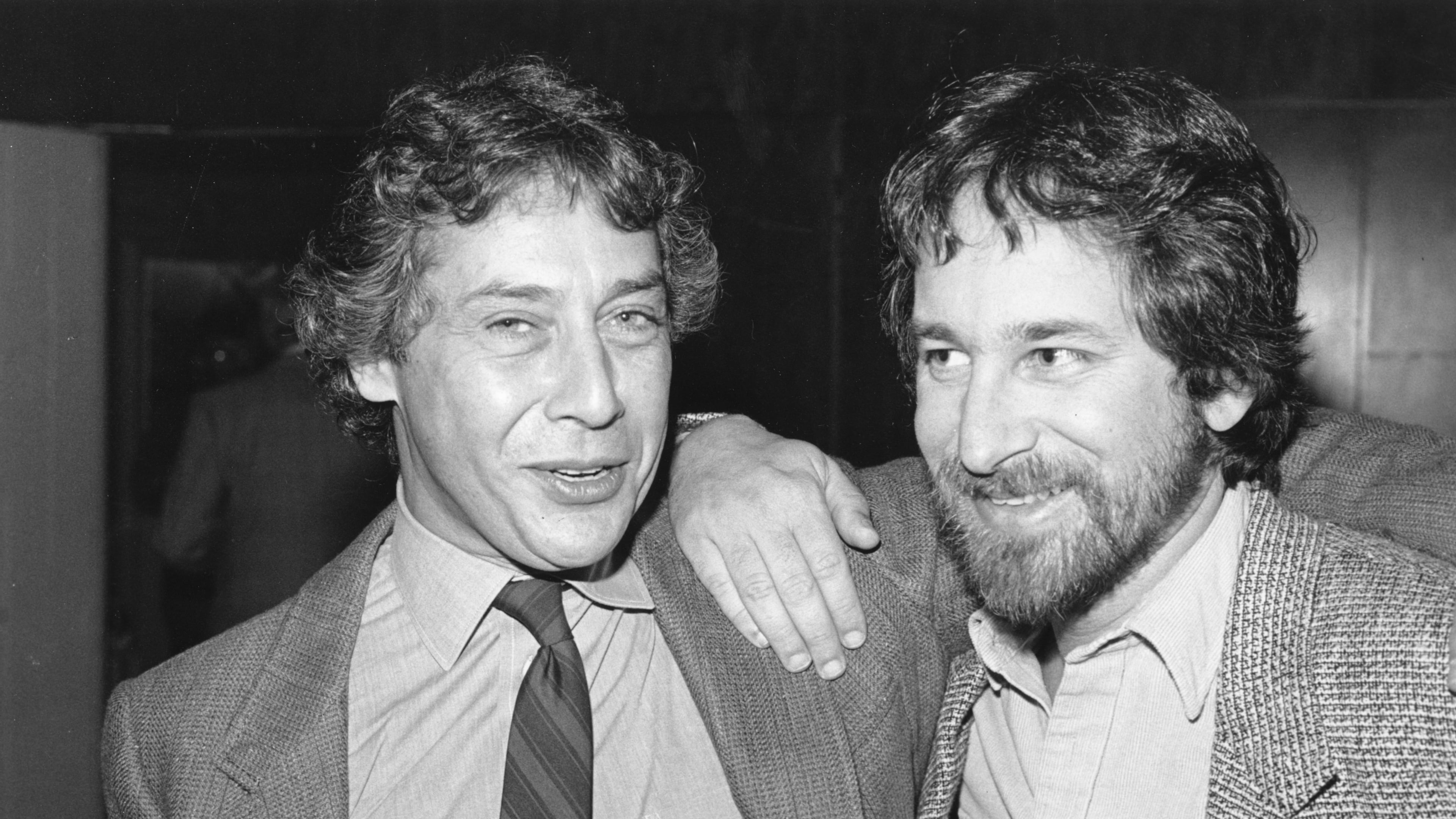 FILE - Directors Mark Rydell, left, and Steven Spielberg are seen together during a break at the 1981, Nominees Luncheon hosted by the Academy of Motion Picture Arts and Sciences in Beverly Hills, Calif. on Tues. March 10, 1982. (AP Photo/Lennox McLendon,File)