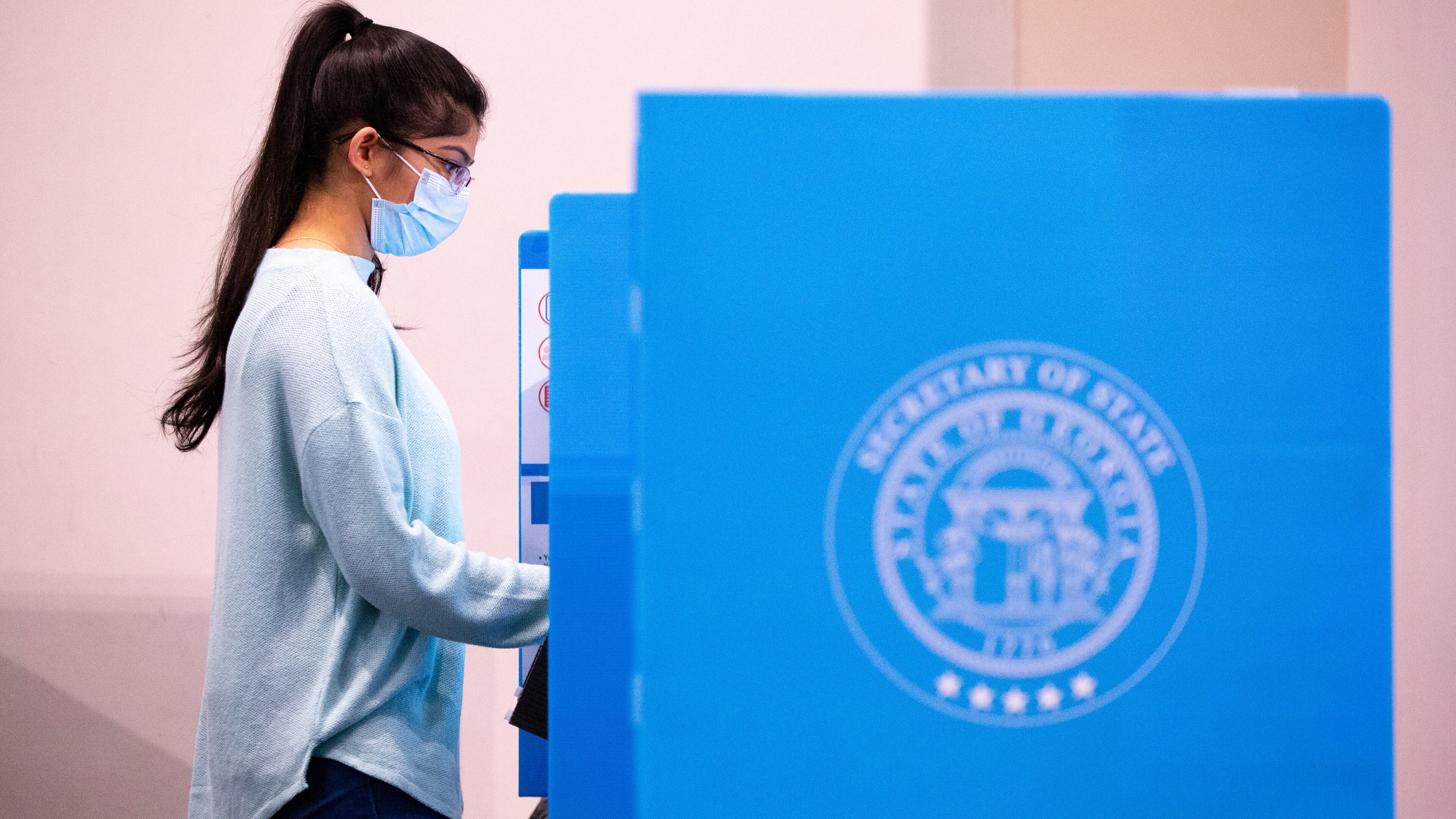 A voter makes her ballot selections at the polls at Berean Baptist Church in Lilburn Nov. 3, 2020. Gwinnett County school board elections were moved to May, and candidates are gearing up for a series of forums ahead of the new election day. (Casey Sykes for The Atlanta-Journal Constitution)