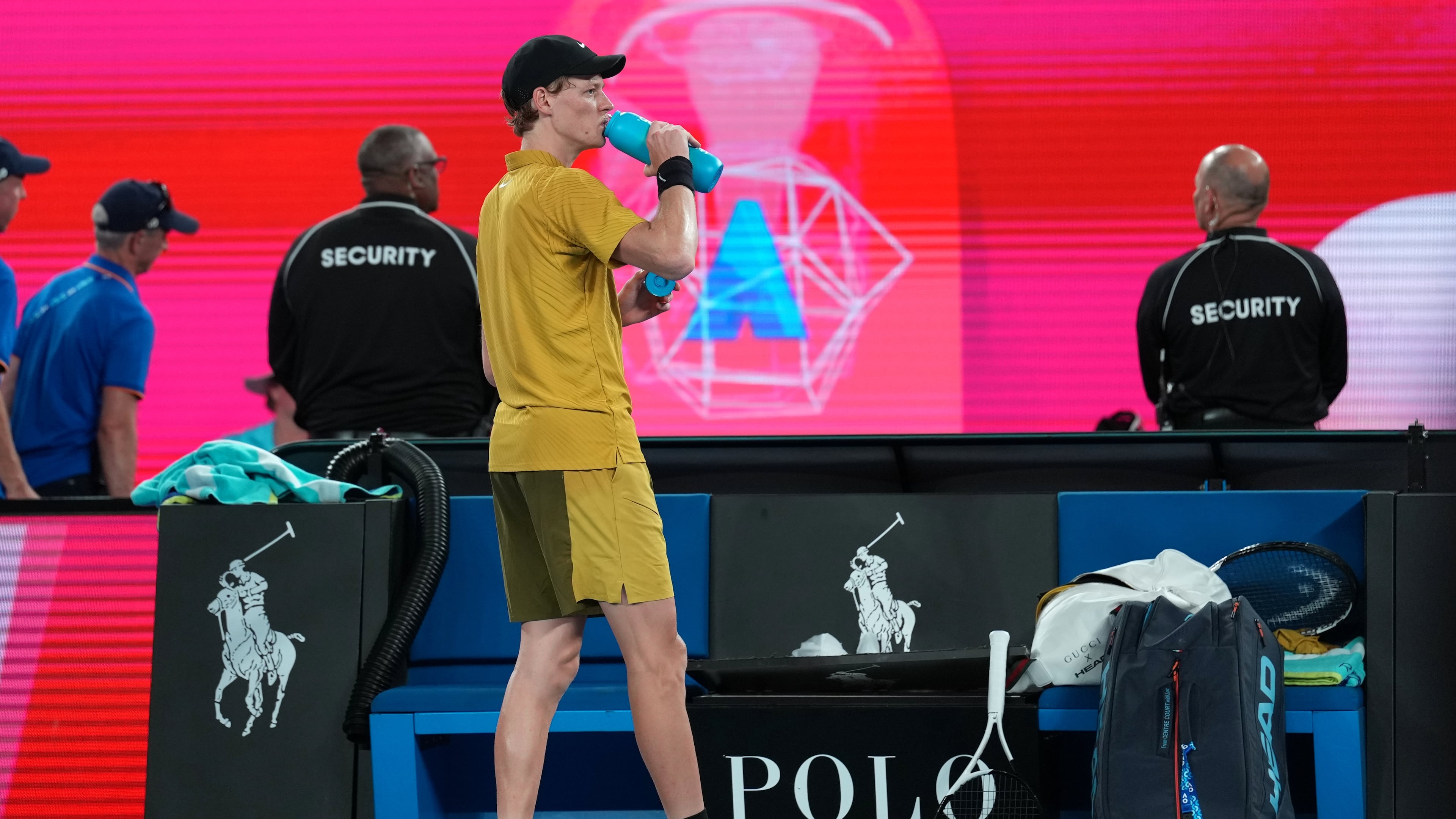 Jannik Sinner of Italy takes a drink during his third round match against Eliot Spizzirri of the U.S. at the Australian Open tennis championship in Melbourne, Australia, Saturday, Jan. 24, 2026. (AP Photo/Dita Alangkara)