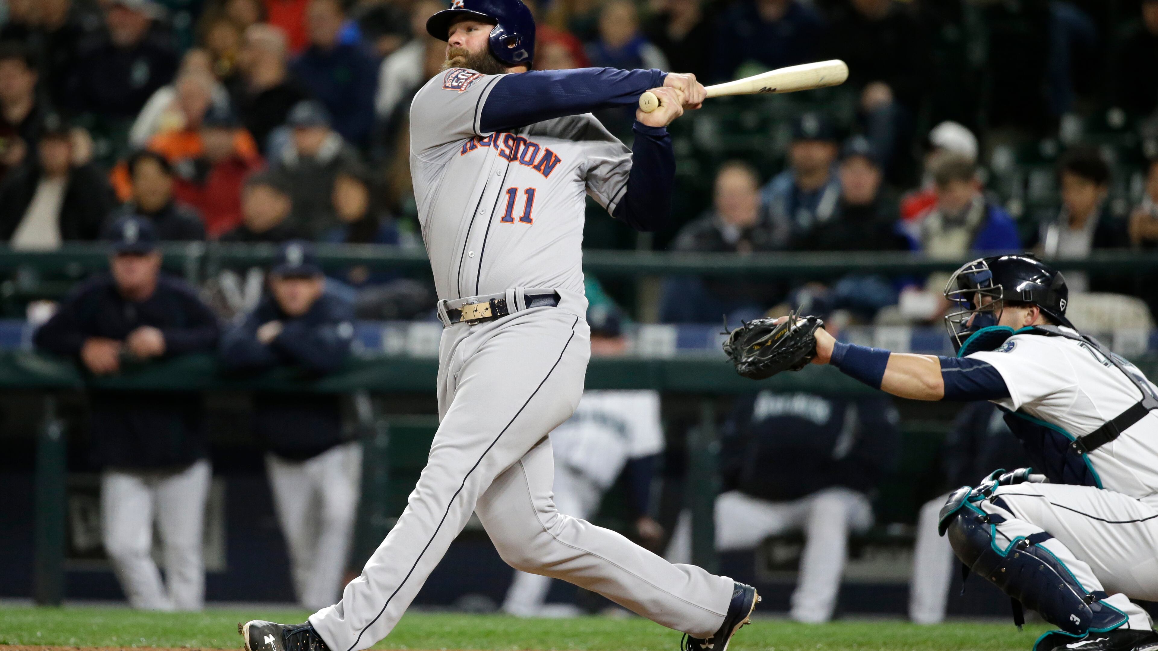 Former Brave Evan Gattis led Houston in home runs and RBIs this season. Tonight he will be opposed by another former Braves' catcher, Brian McCann. (AP photo)