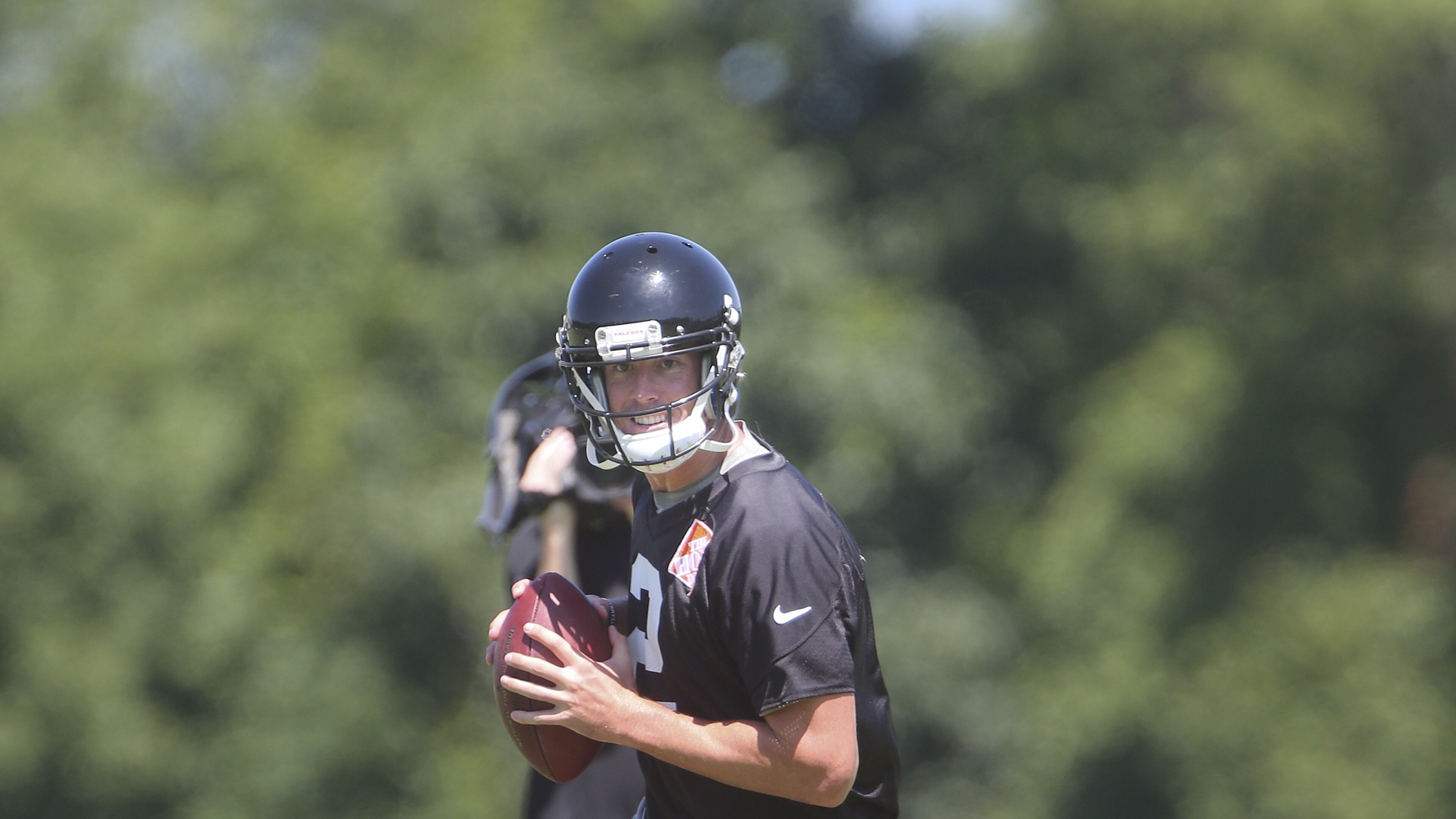Atlanta Falcons quarterback Matt Ryan (2) throws a pass during their NFL football practice Thursday, June 16, 2016, in Flowery Branch, Ga. (AP Photo/John Bazemore)