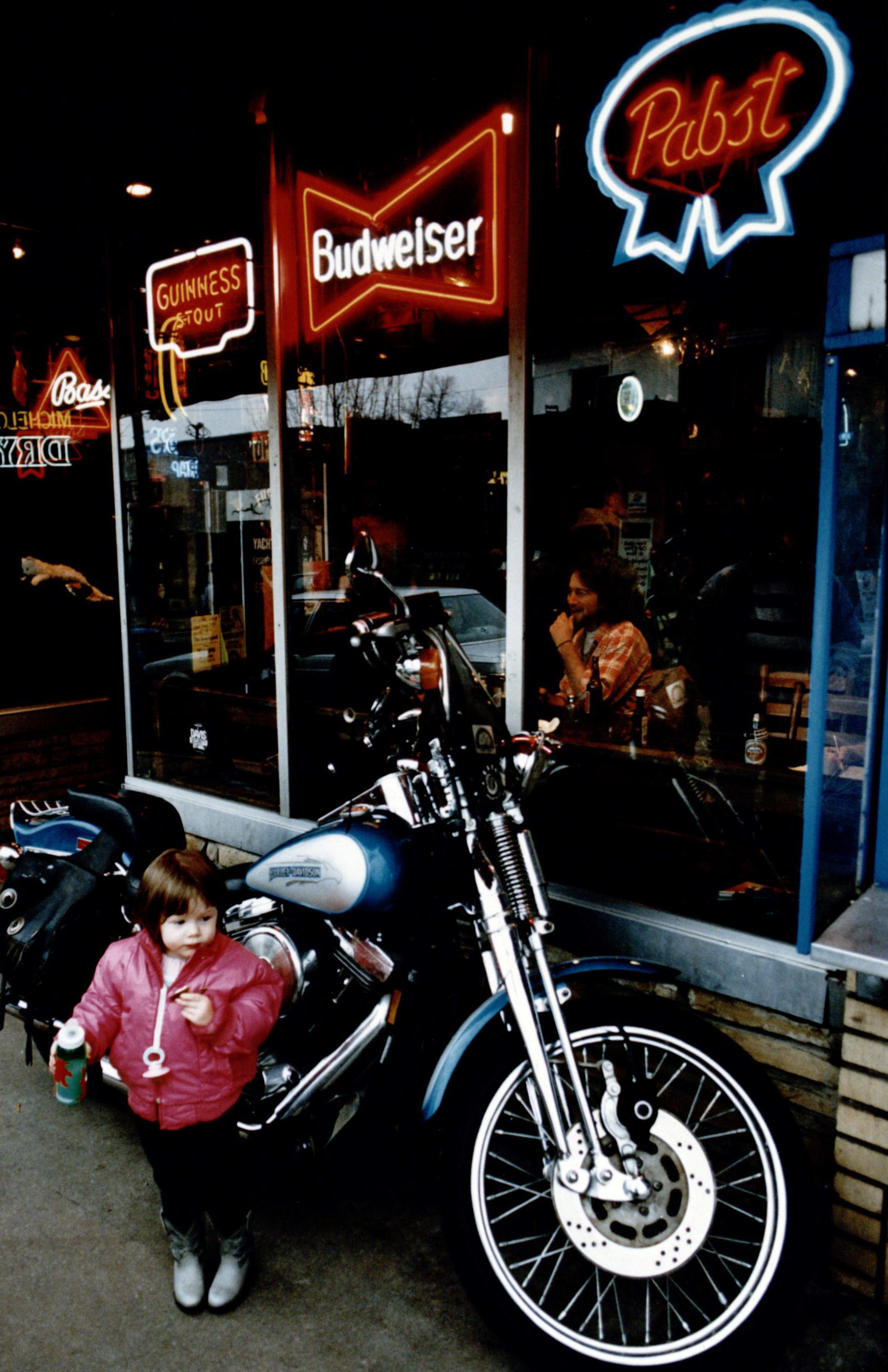 The original caption on this photo from Jan. 1993 reads: "Biker baby: Scooter Morgan, 2, hangs out in front of the Euclid Yacht Club in Little Five Points."